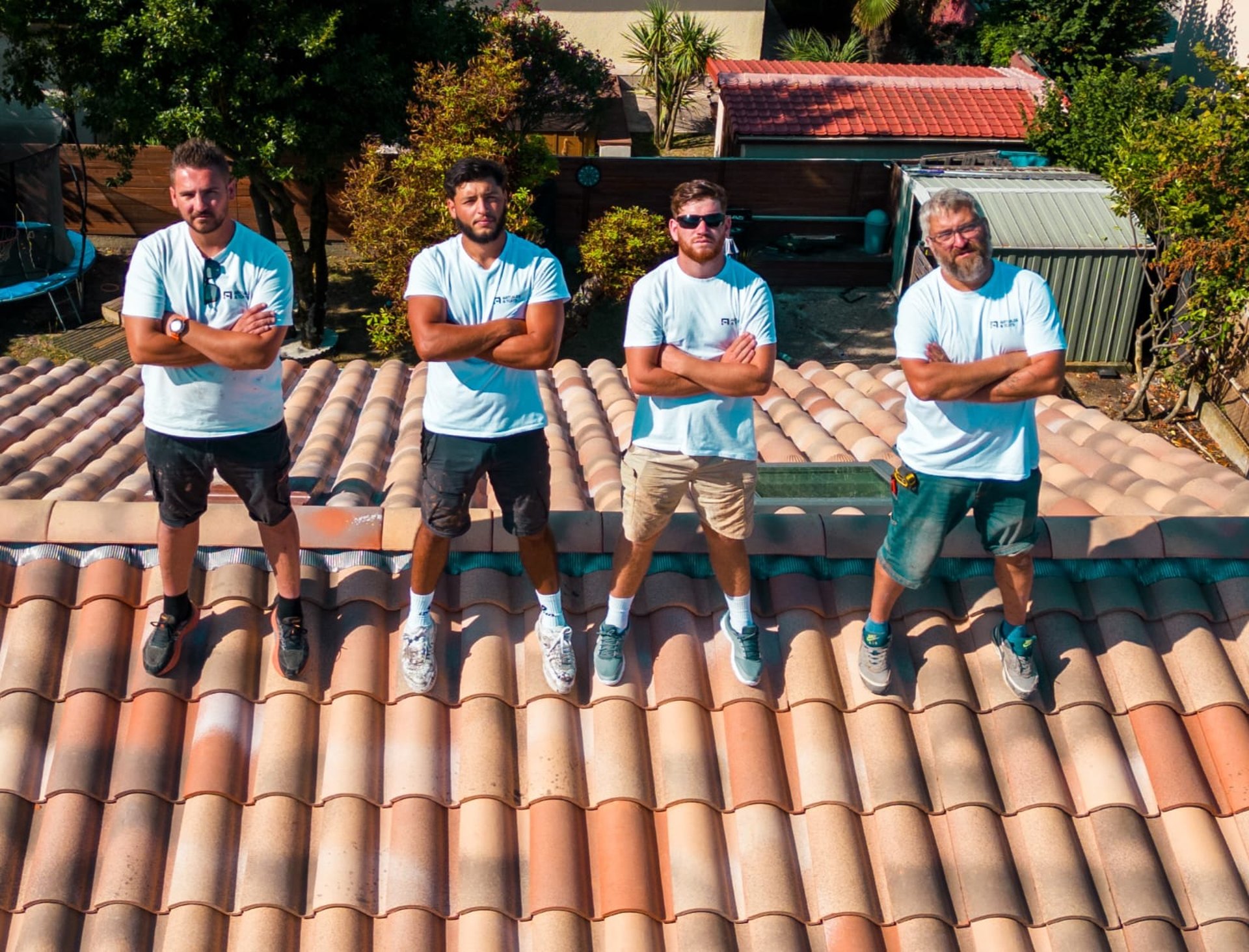 a person wearing blue gloves and holding a hammer