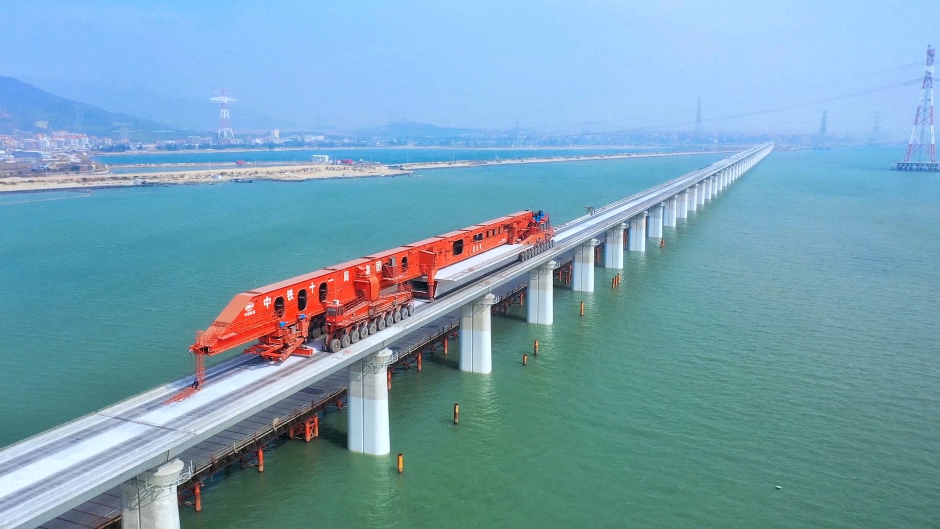 an abstract photo of a curved building with a blue sky in the background