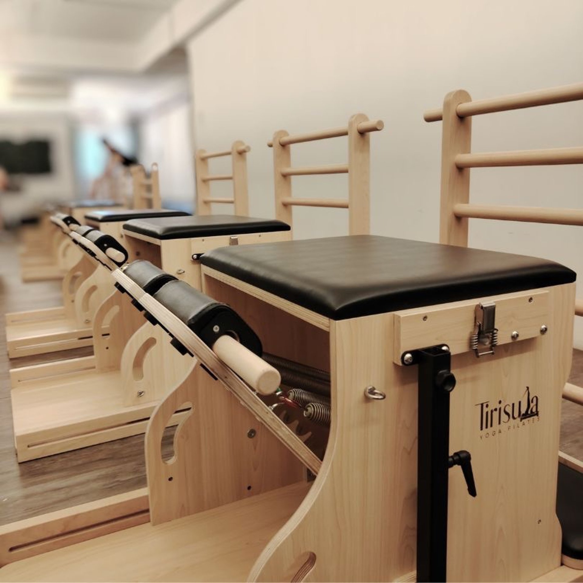 an abstract photo of a curved building with a blue sky in the background