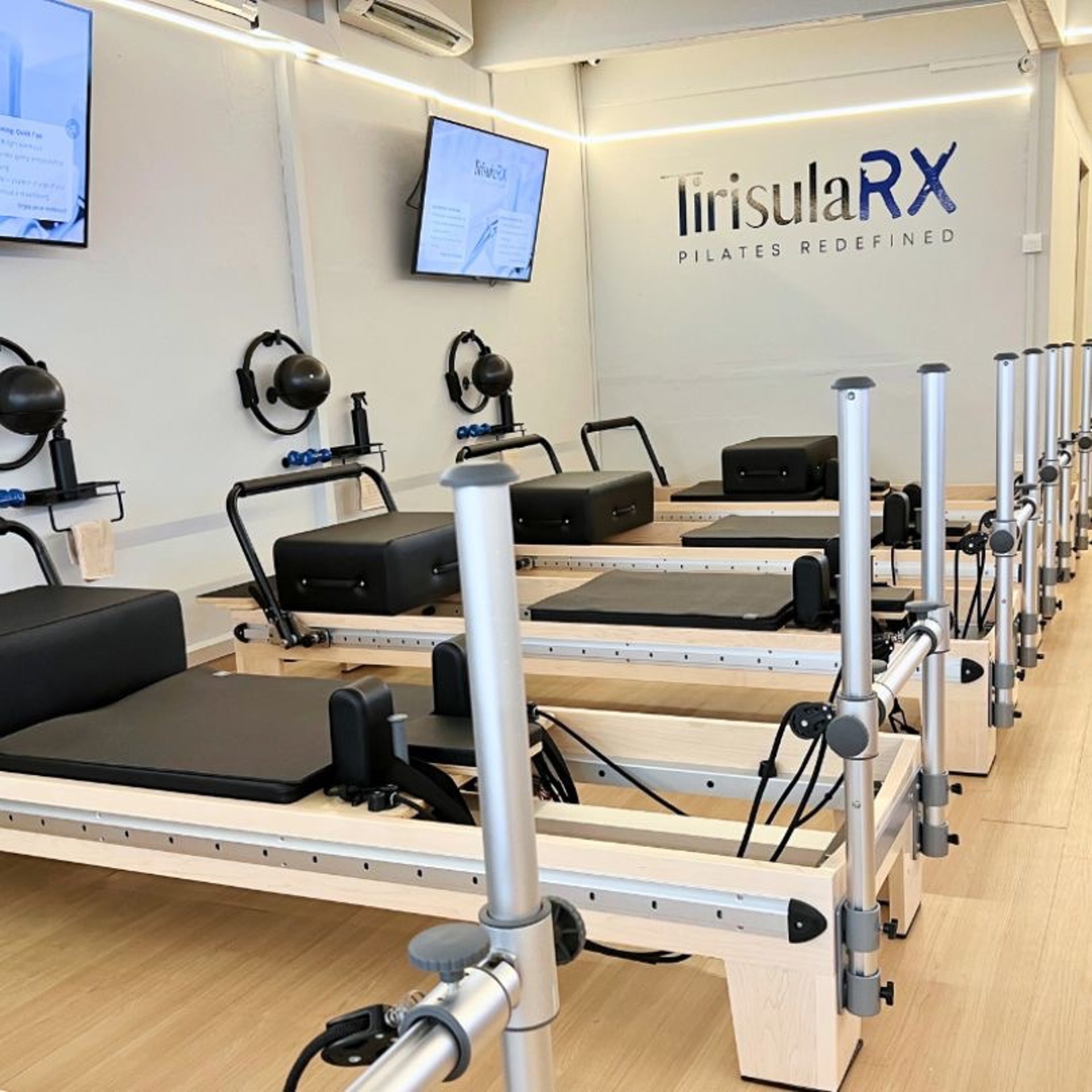 an abstract photo of a curved building with a blue sky in the background