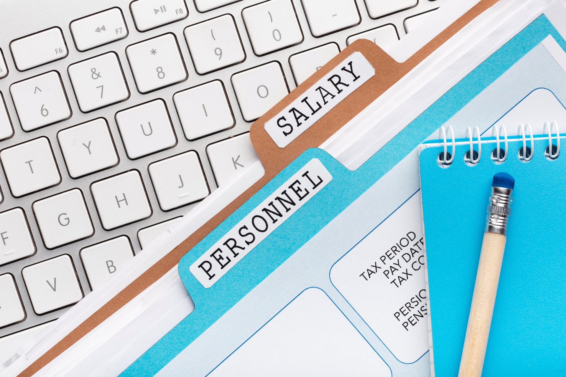 an abstract photo of a curved building with a blue sky in the background