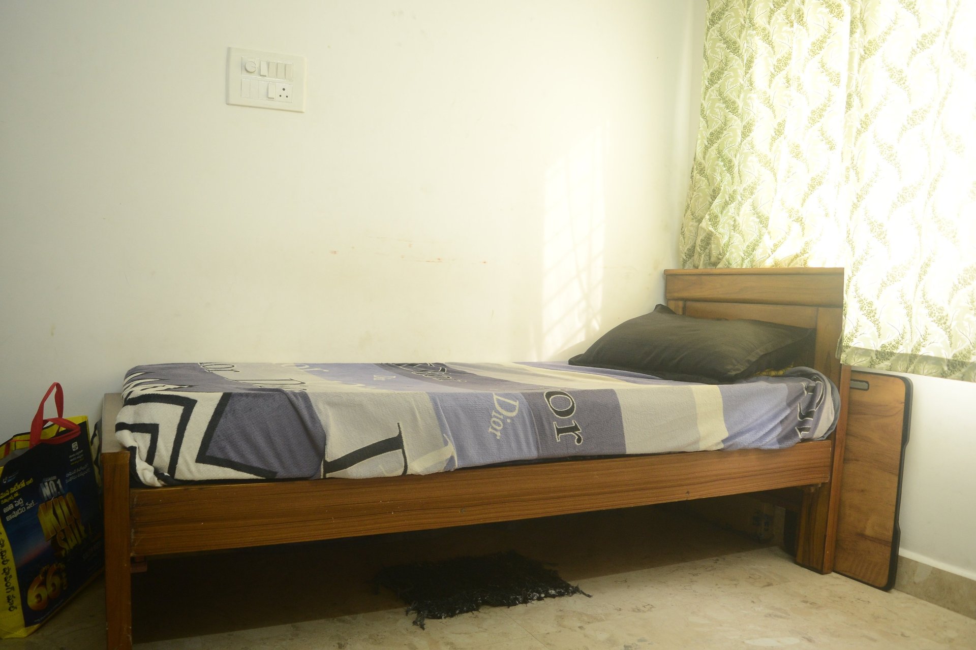 white and gray floral bed linen