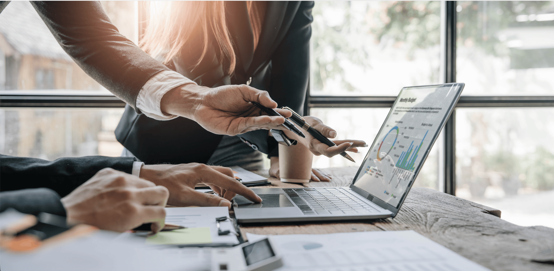 woman in black pants standing on window during daytime