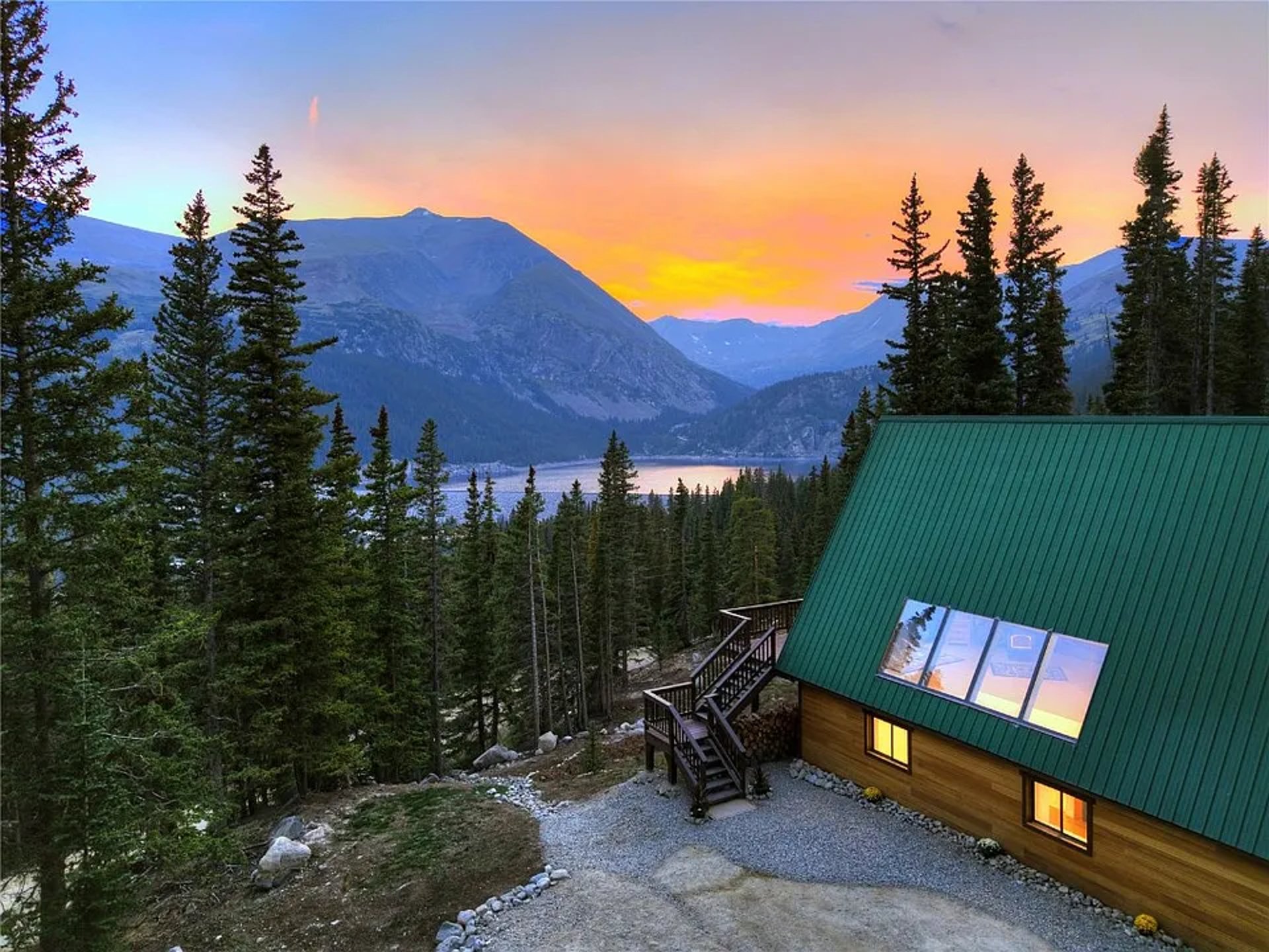 an abstract photo of a curved building with a blue sky in the background