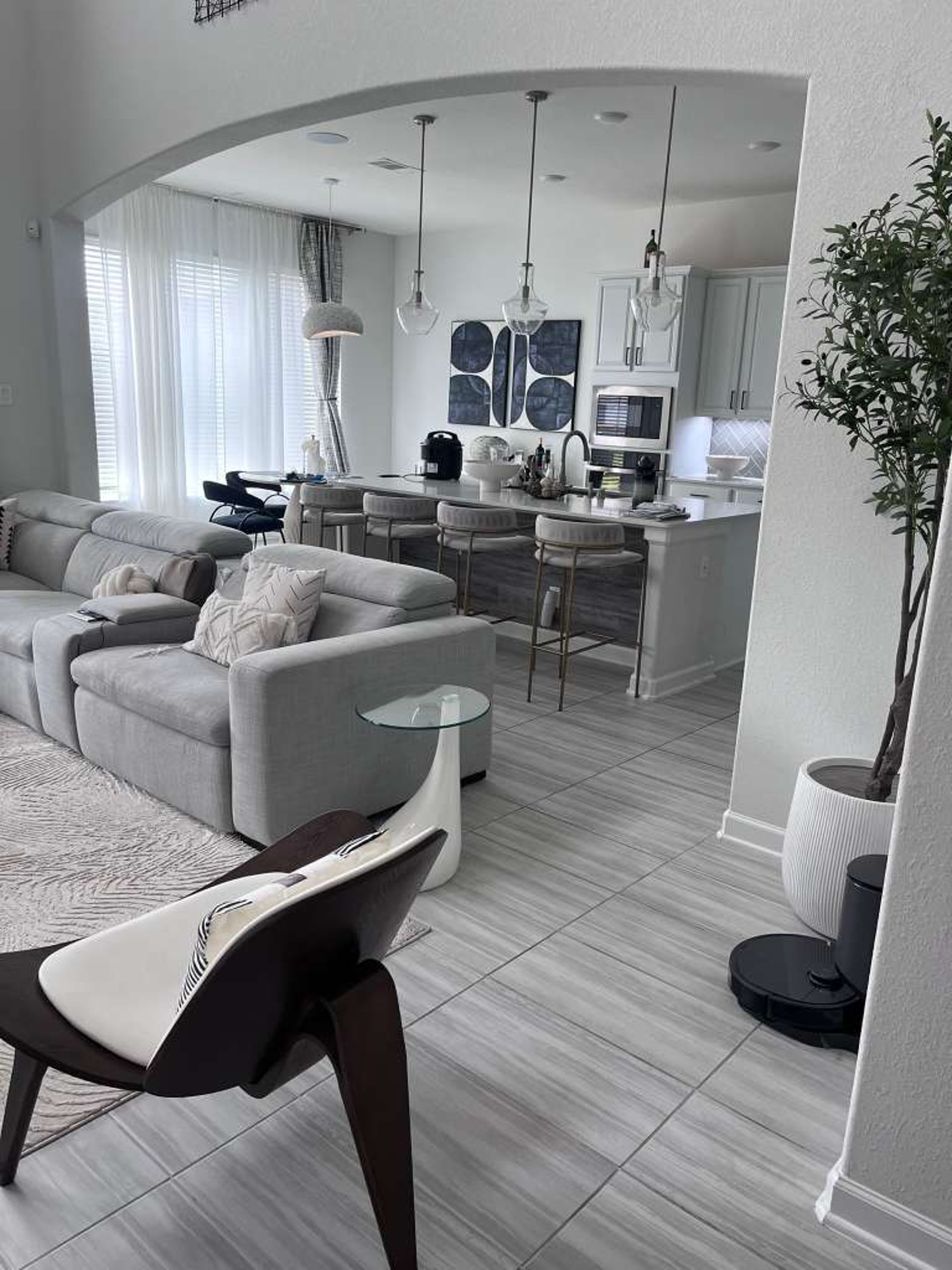 an abstract photo of a curved building with a blue sky in the background