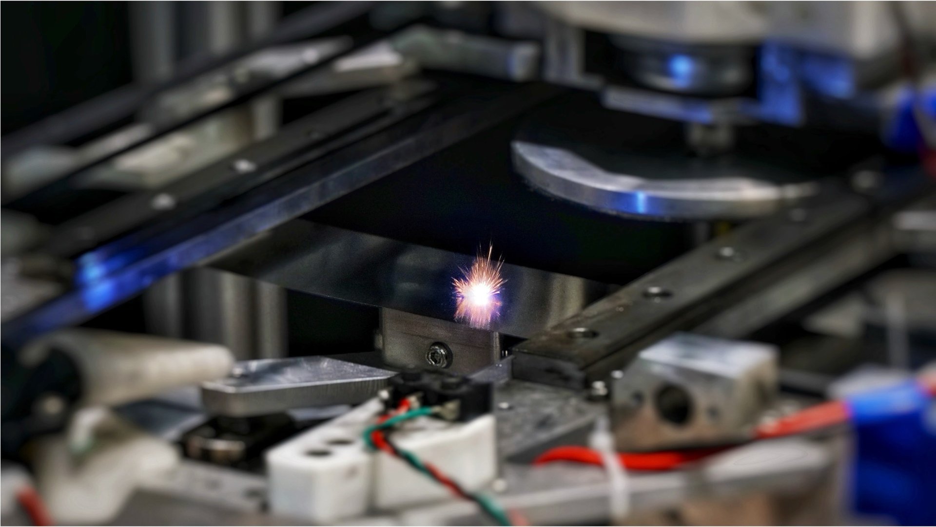 an abstract photo of a curved building with a blue sky in the background
