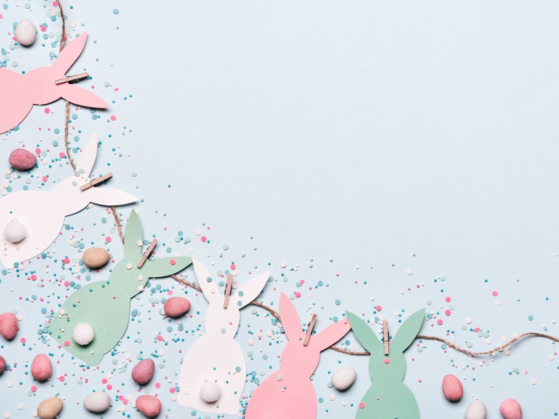 a bird nest filled with eggs on top of a table