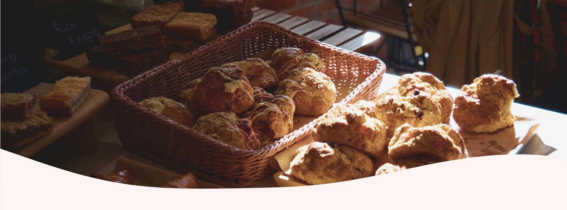 an abstract photo of a curved building with a blue sky in the background