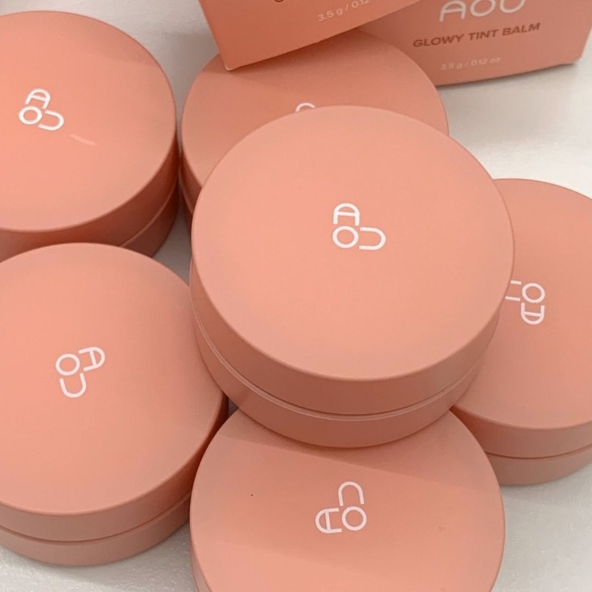 woman wearing yellow long-sleeved dress under white clouds and blue sky during daytime