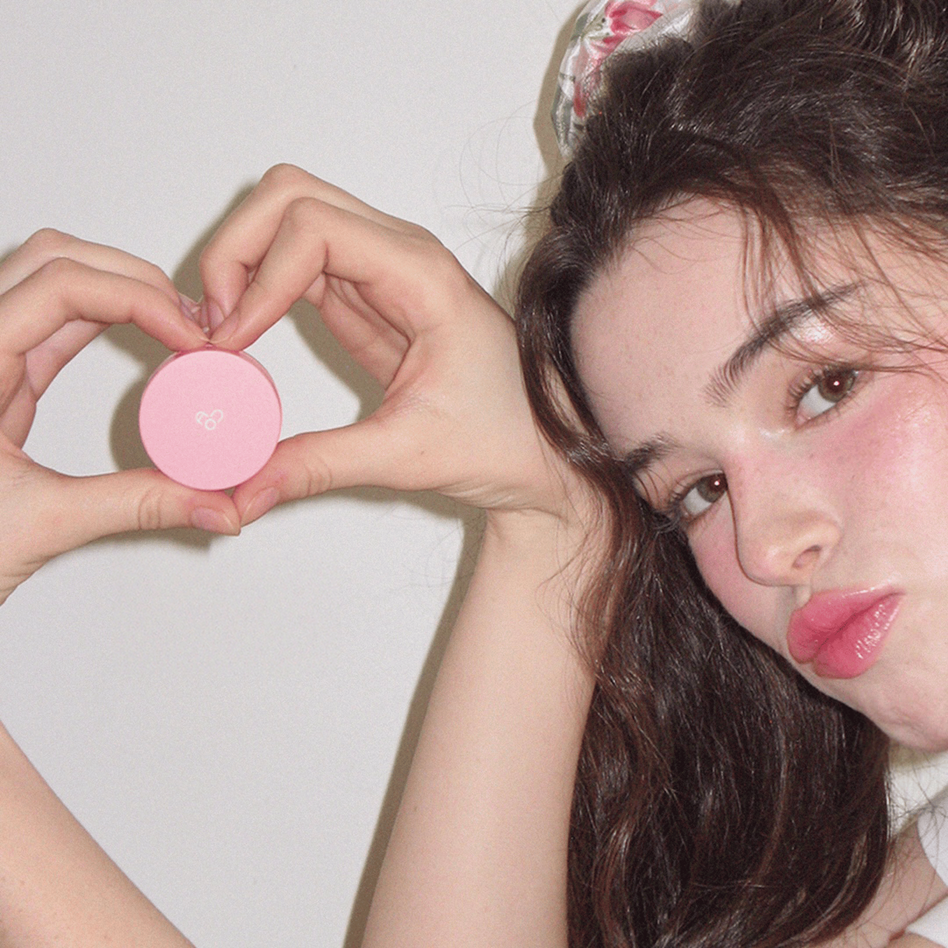 woman holding dried flower