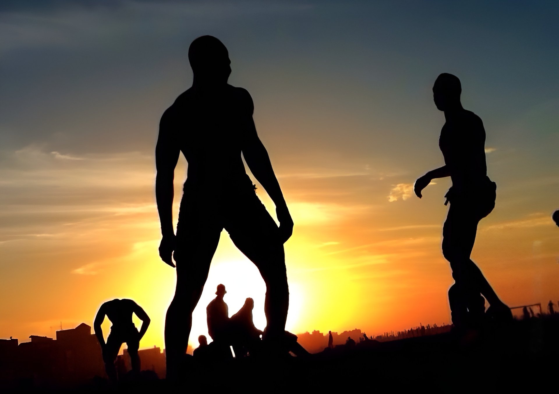 an abstract photo of a curved building with a blue sky in the background