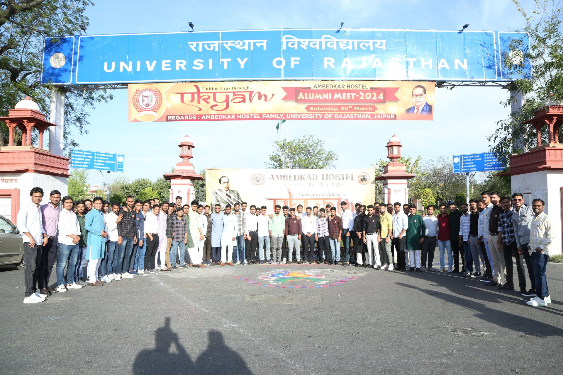 woman wearing yellow long-sleeved dress under white clouds and blue sky during daytime