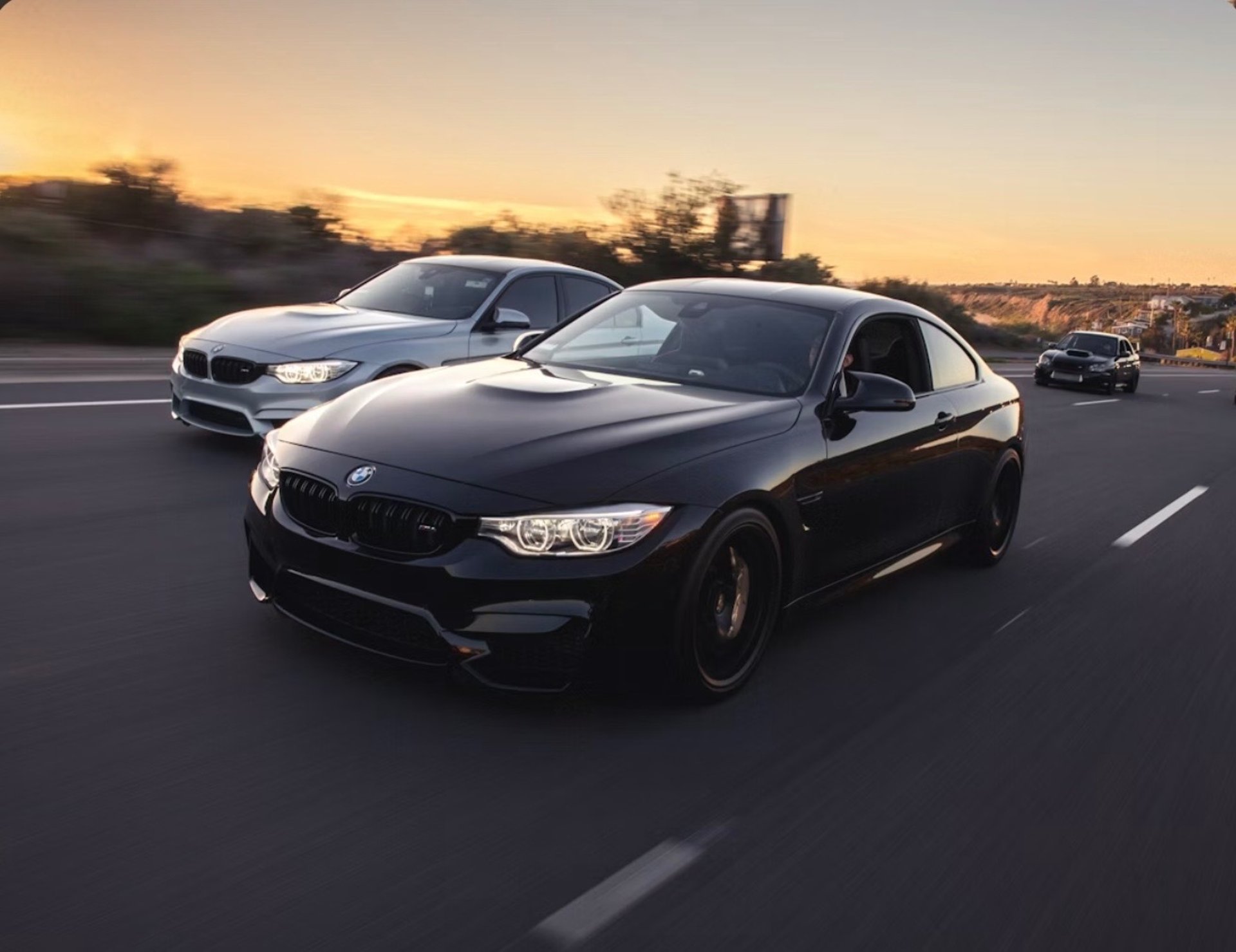 black honda sedan on road during daytime