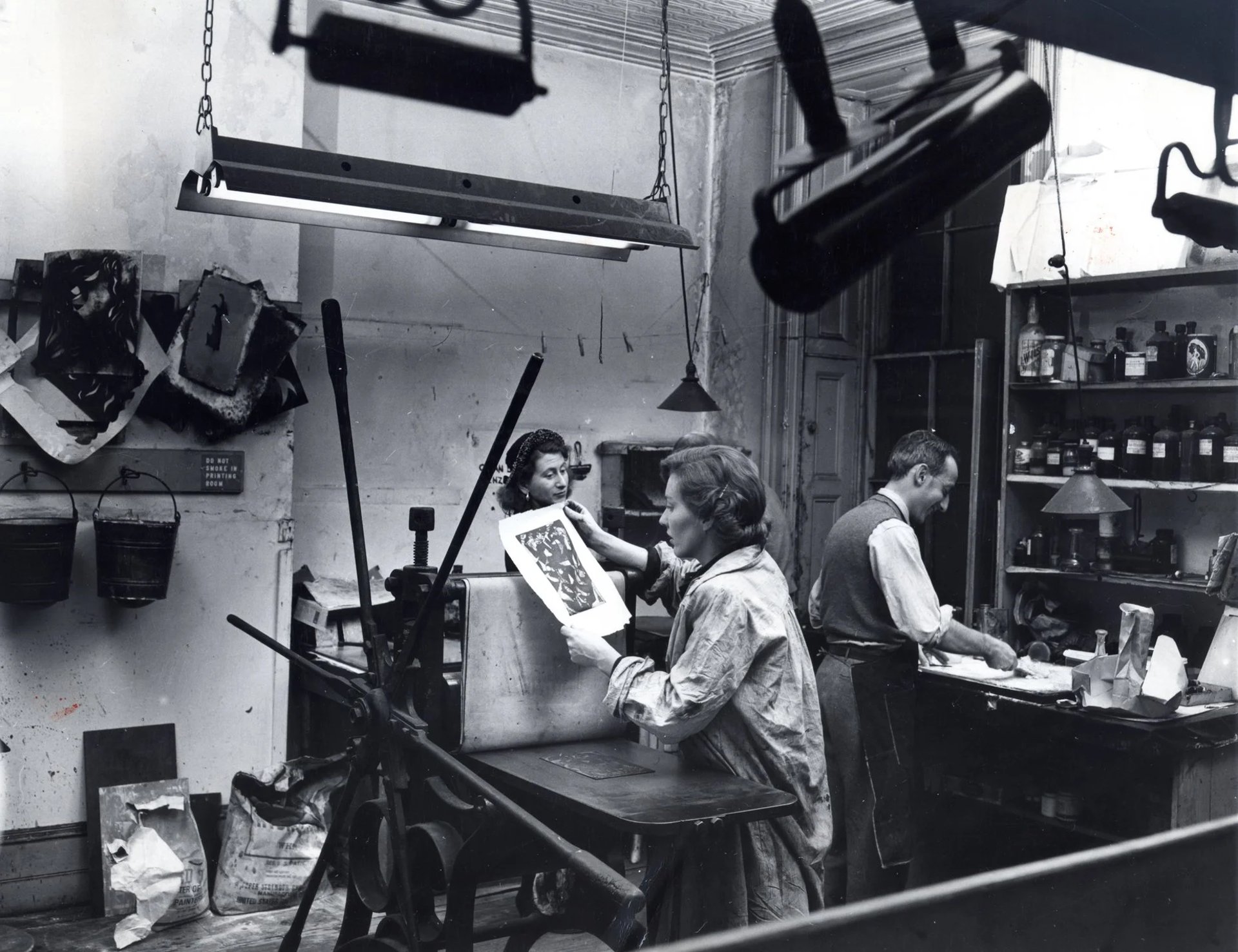 black and brown leather padded tub sofa