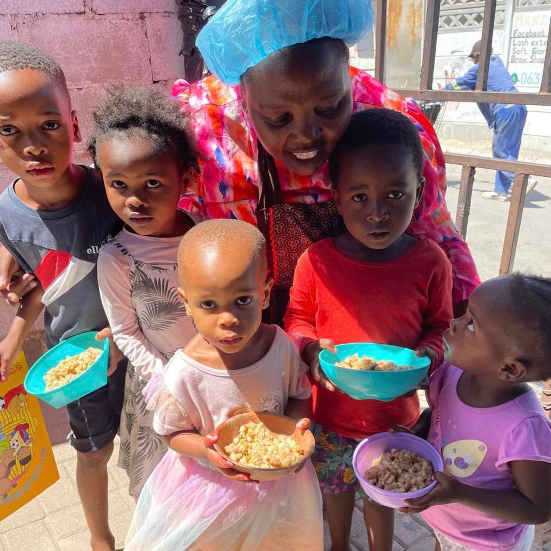 an abstract photo of a curved building with a blue sky in the background