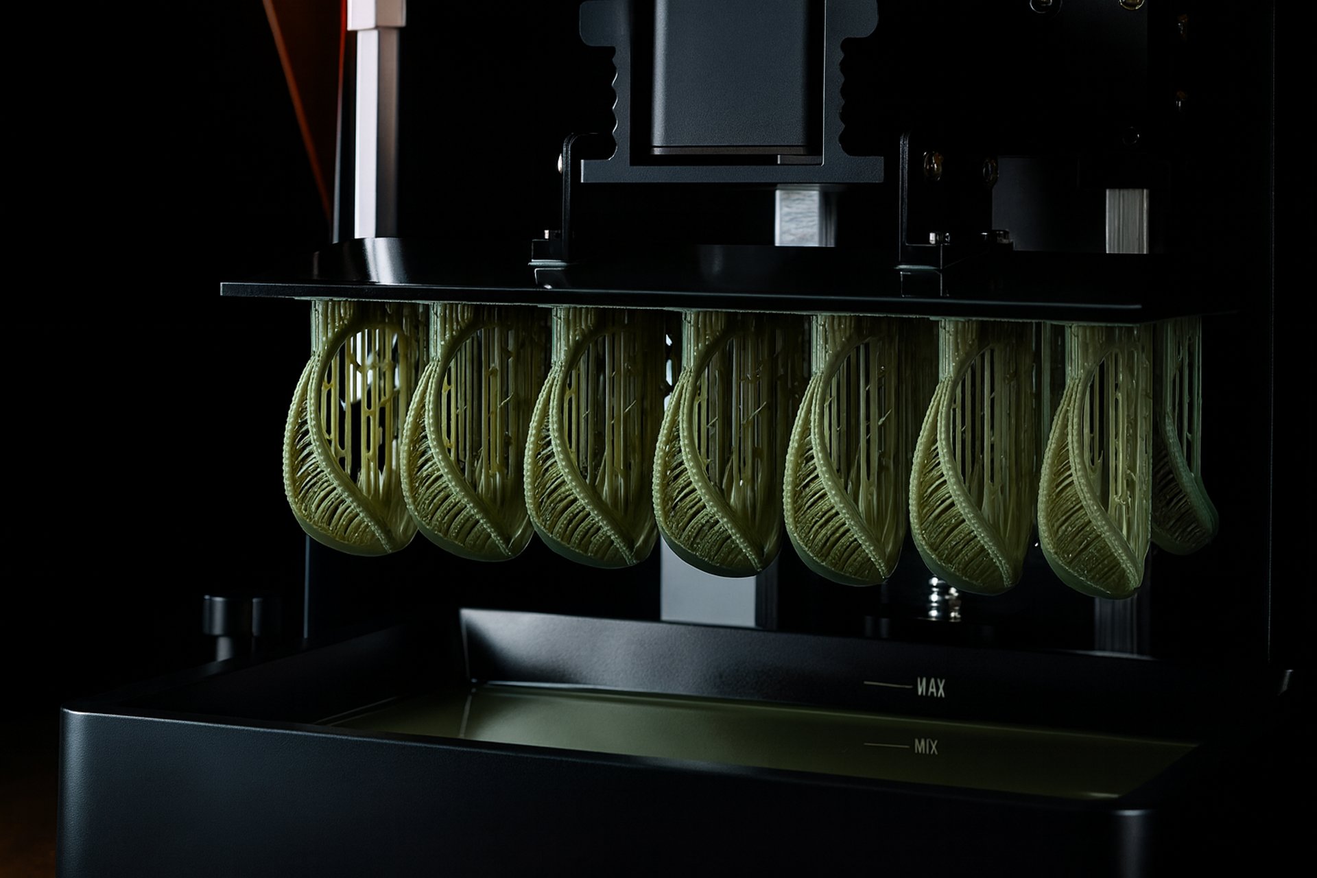 an abstract photo of a curved building with a blue sky in the background