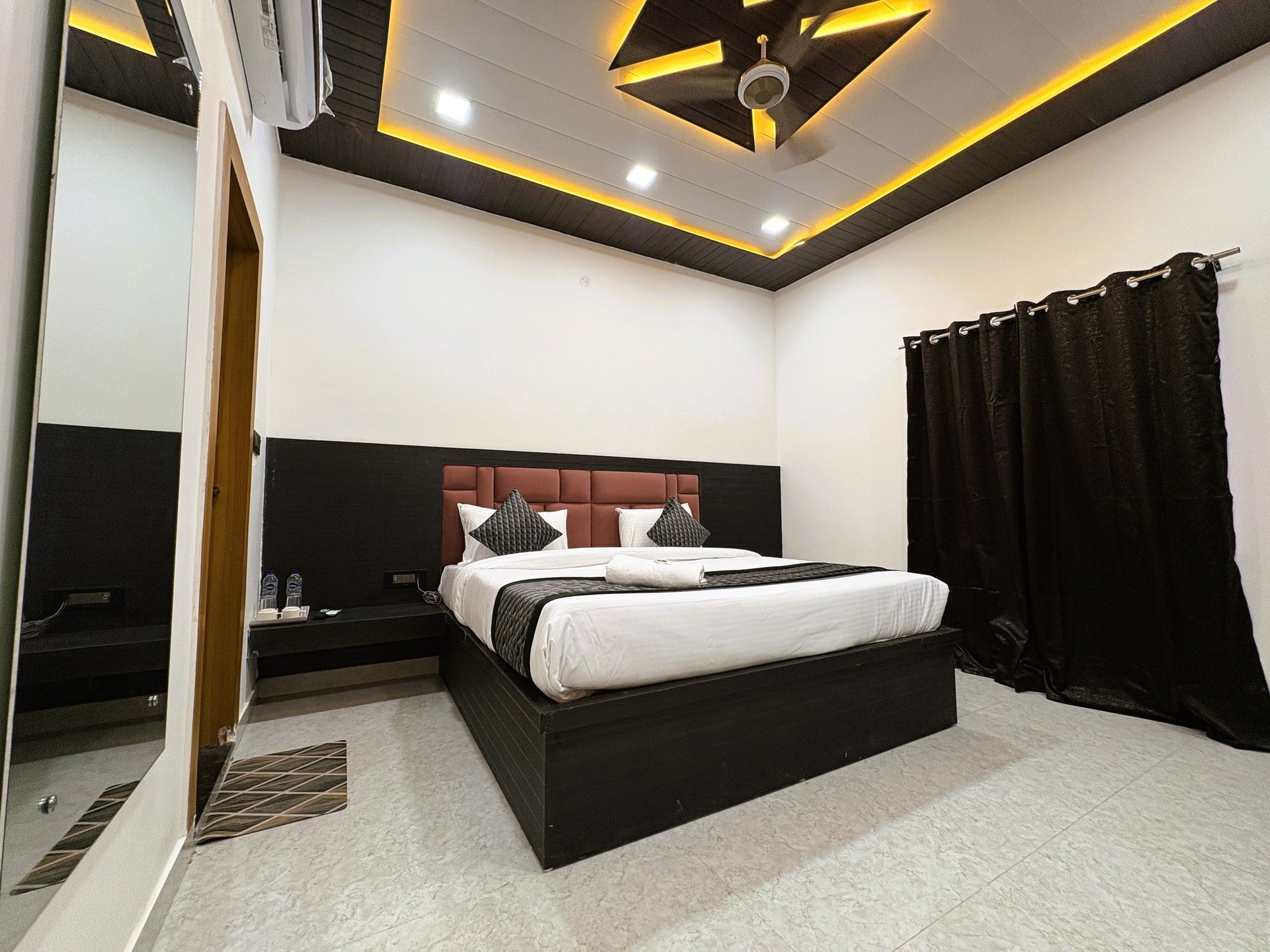 woman wearing yellow long-sleeved dress under white clouds and blue sky during daytime