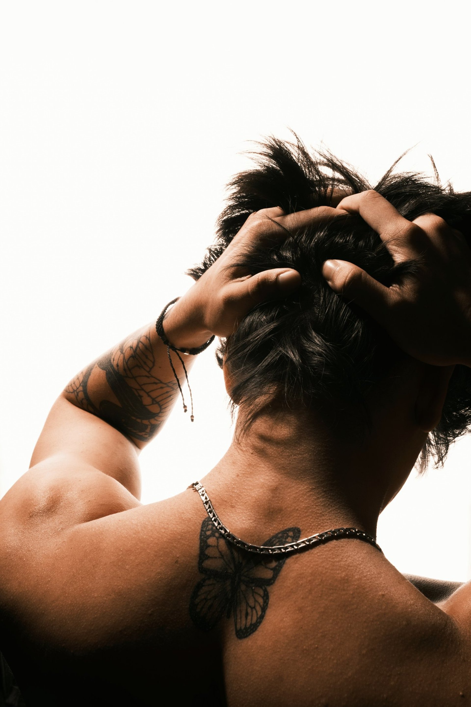 woman wearing yellow long-sleeved dress under white clouds and blue sky during daytime