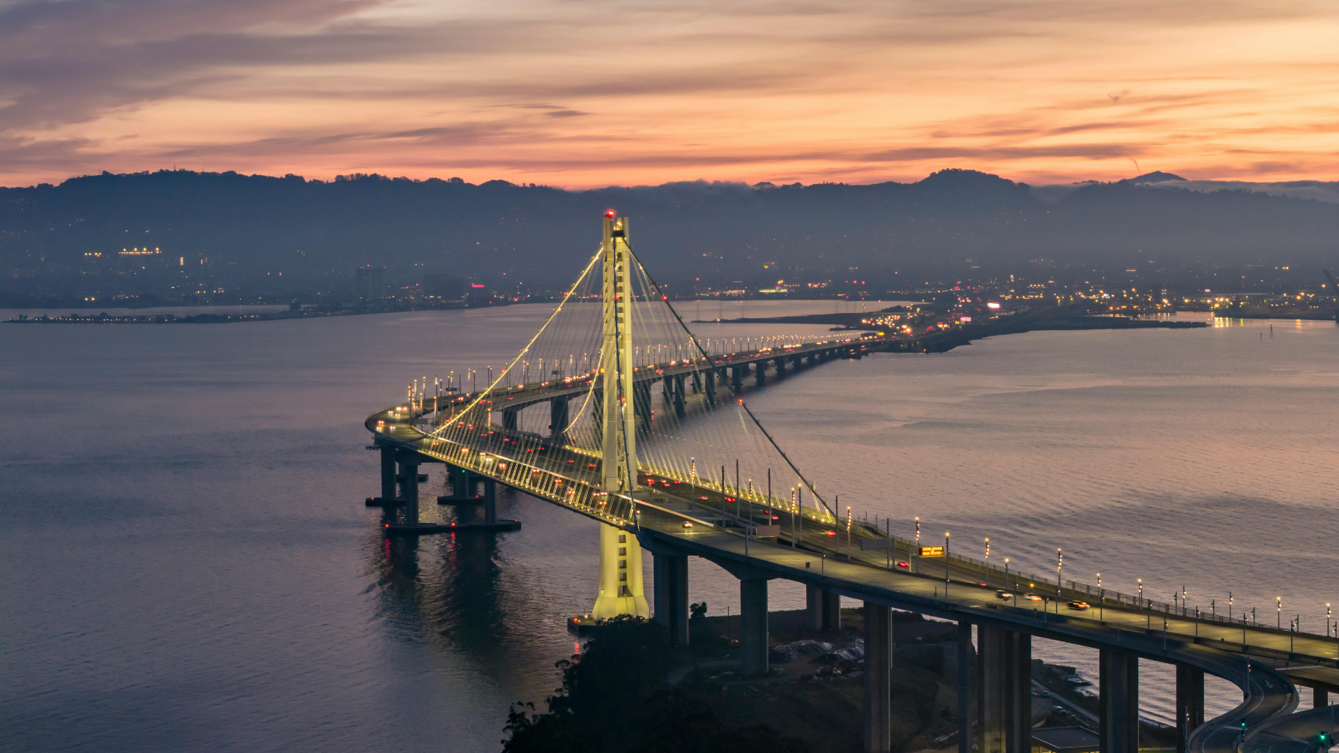 an abstract photo of a curved building with a blue sky in the background