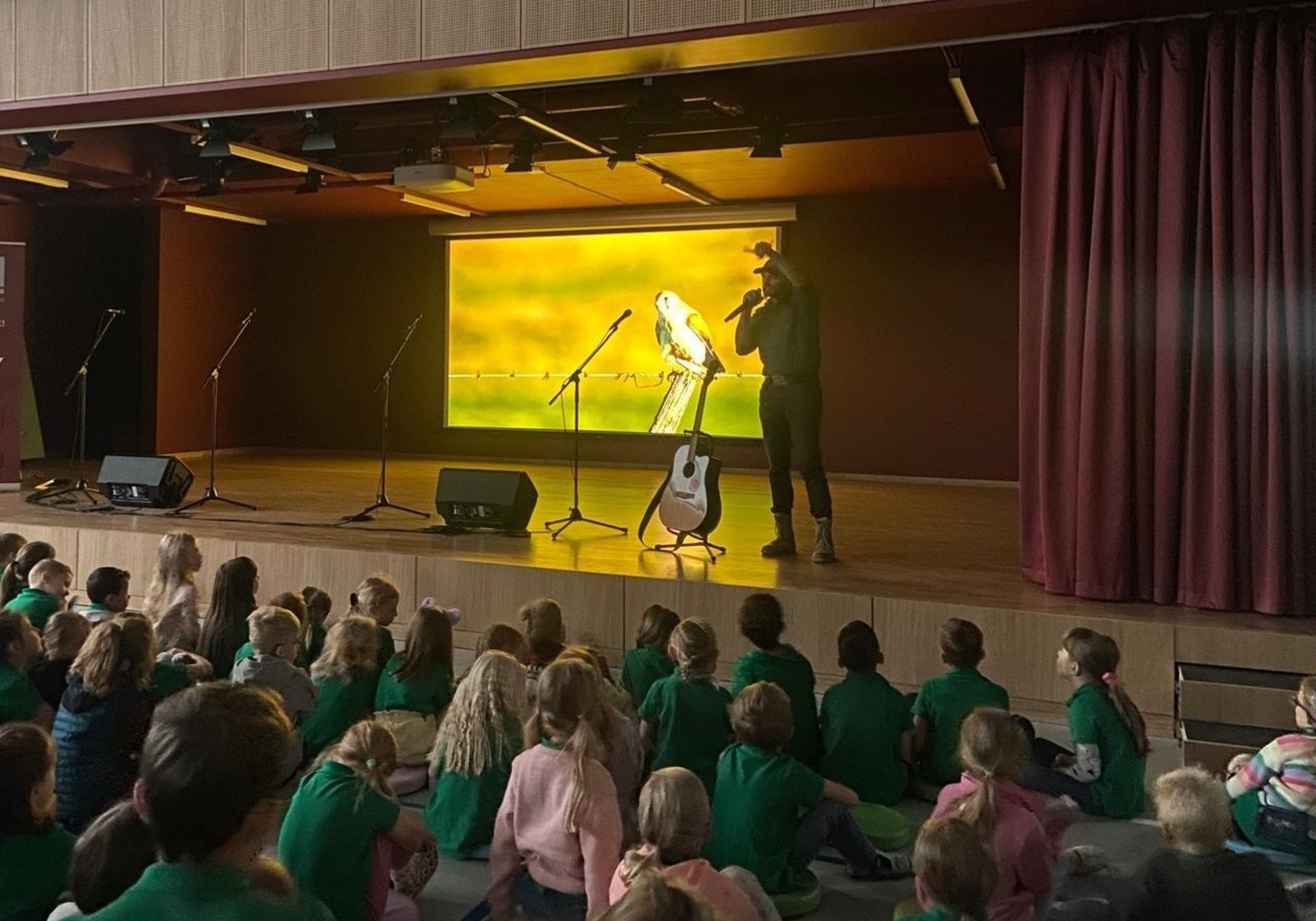 an abstract photo of a curved building with a blue sky in the background