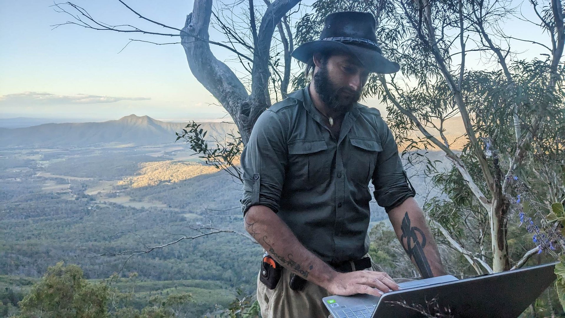 an abstract photo of a curved building with a blue sky in the background