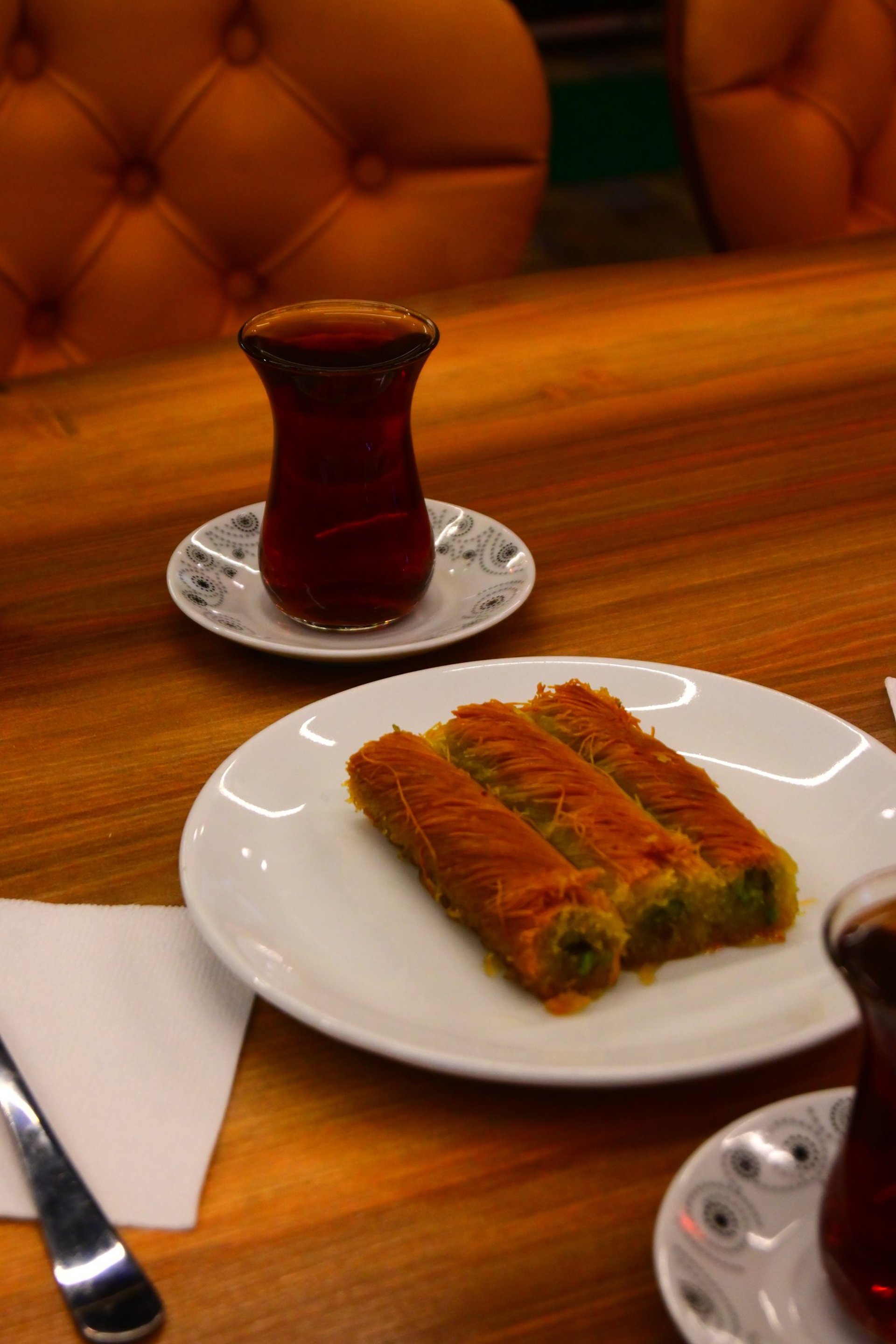 woman wearing yellow long-sleeved dress under white clouds and blue sky during daytime