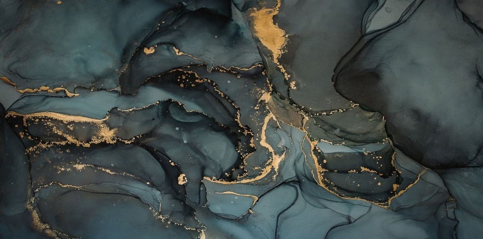 an abstract photo of a curved building with a blue sky in the background