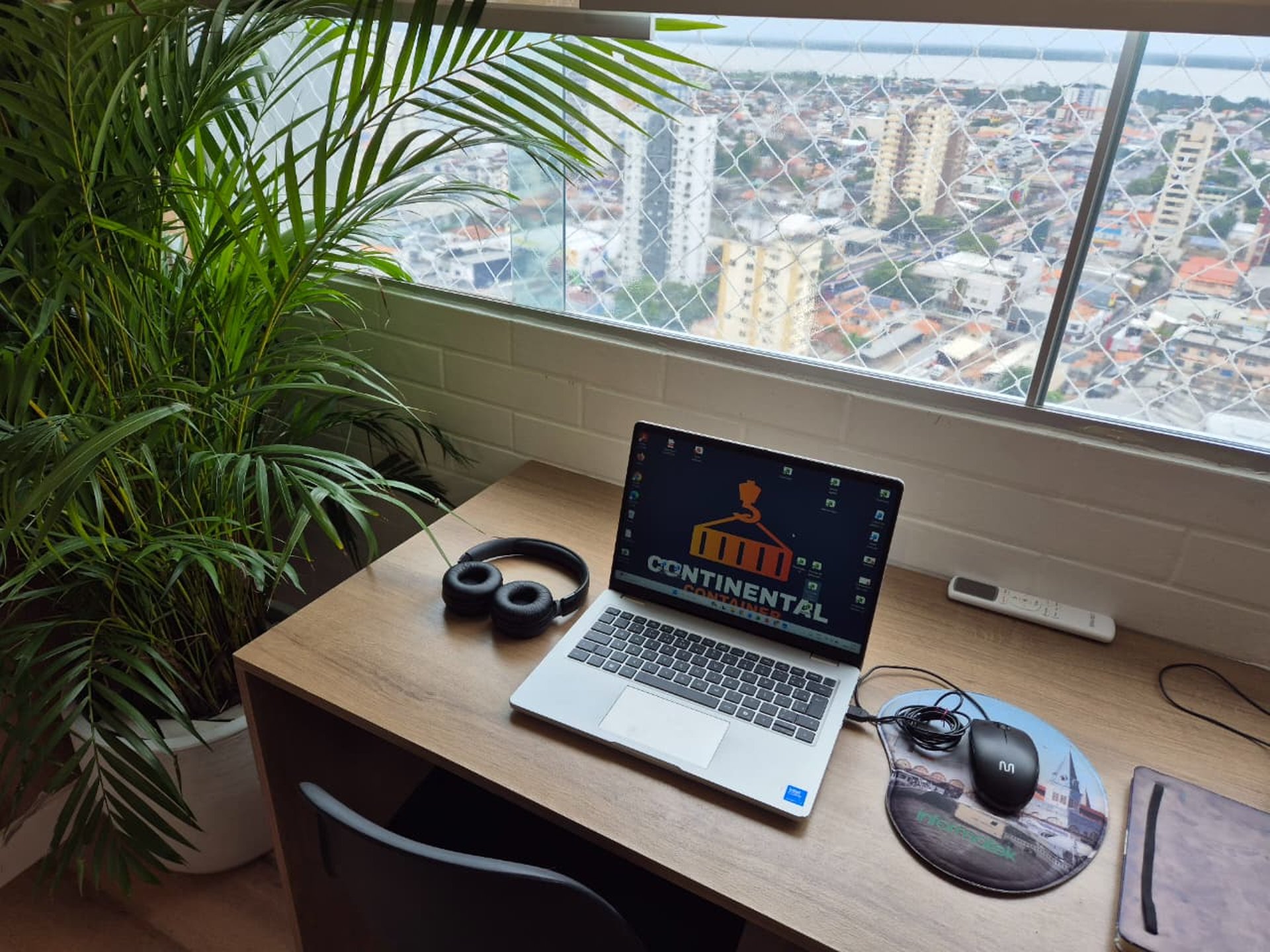 an abstract photo of a curved building with a blue sky in the background