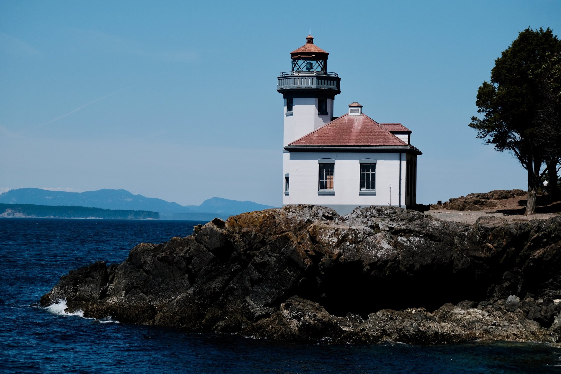 a close up of a black and brown abstract painting