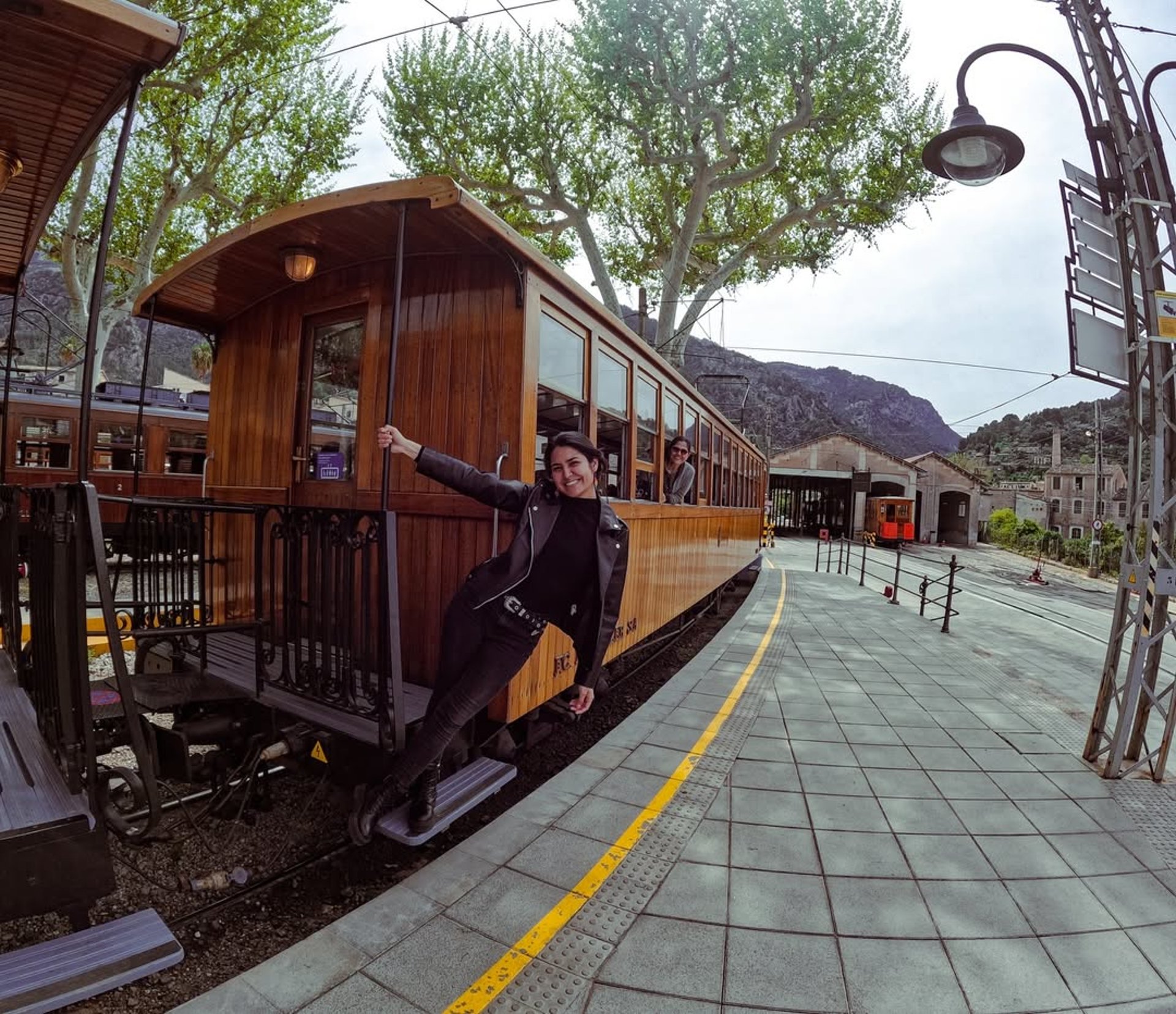 an abstract photo of a curved building with a blue sky in the background