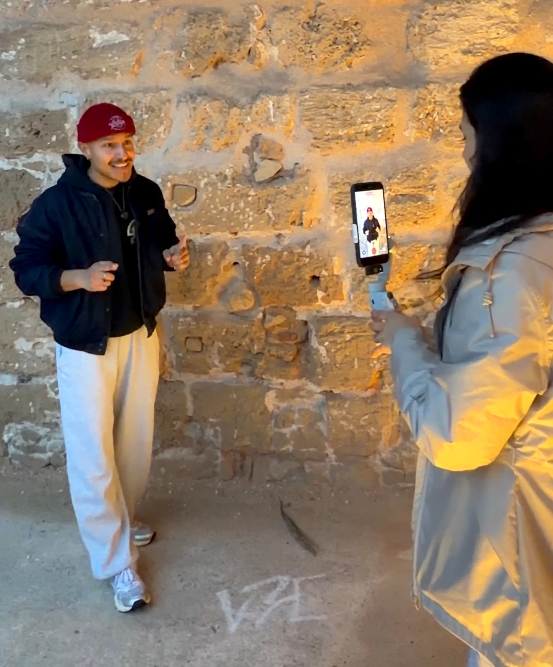 an abstract photo of a curved building with a blue sky in the background