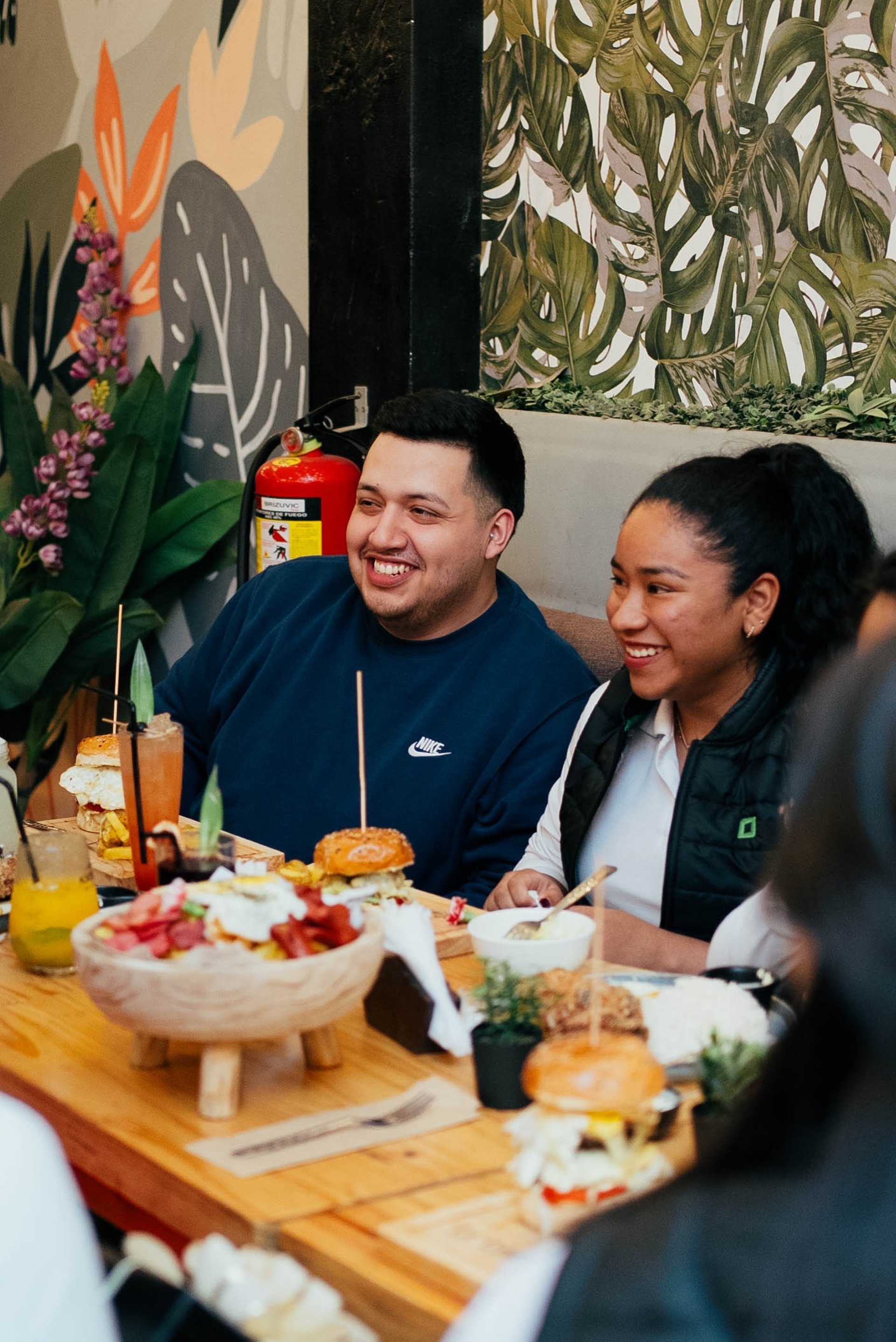 an abstract photo of a curved building with a blue sky in the background