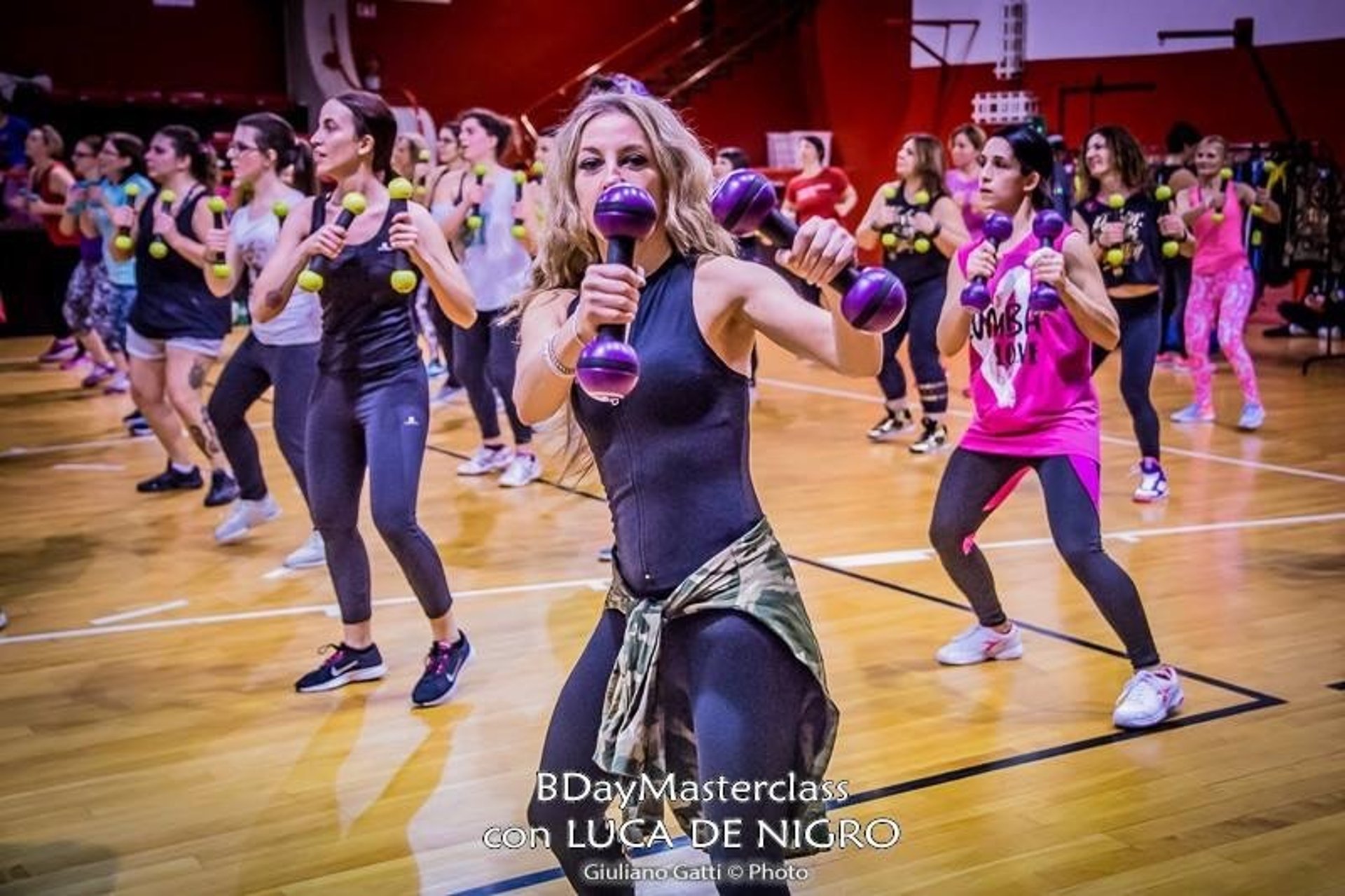 an abstract photo of a curved building with a blue sky in the background