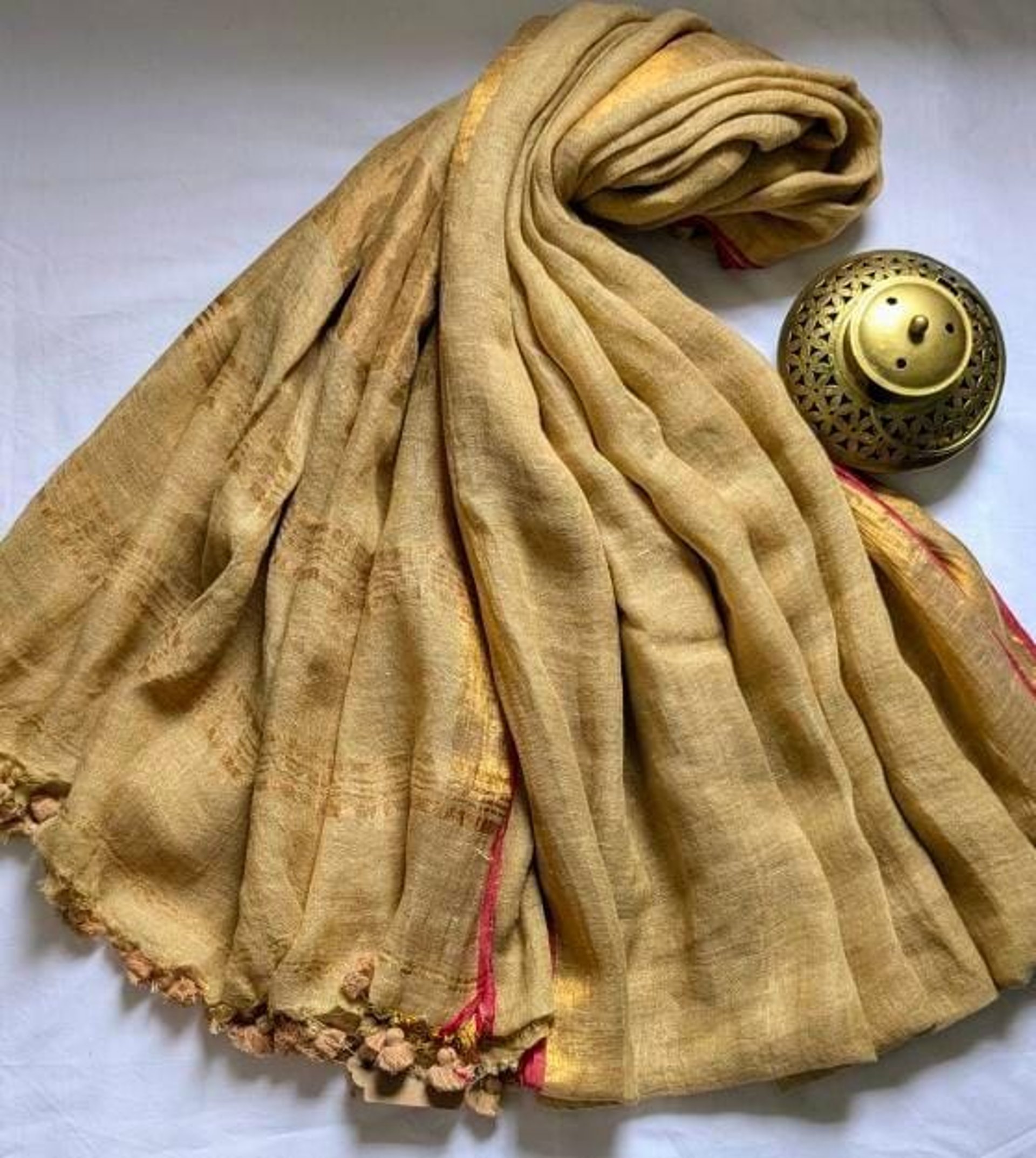 person wearing grey knit sweater