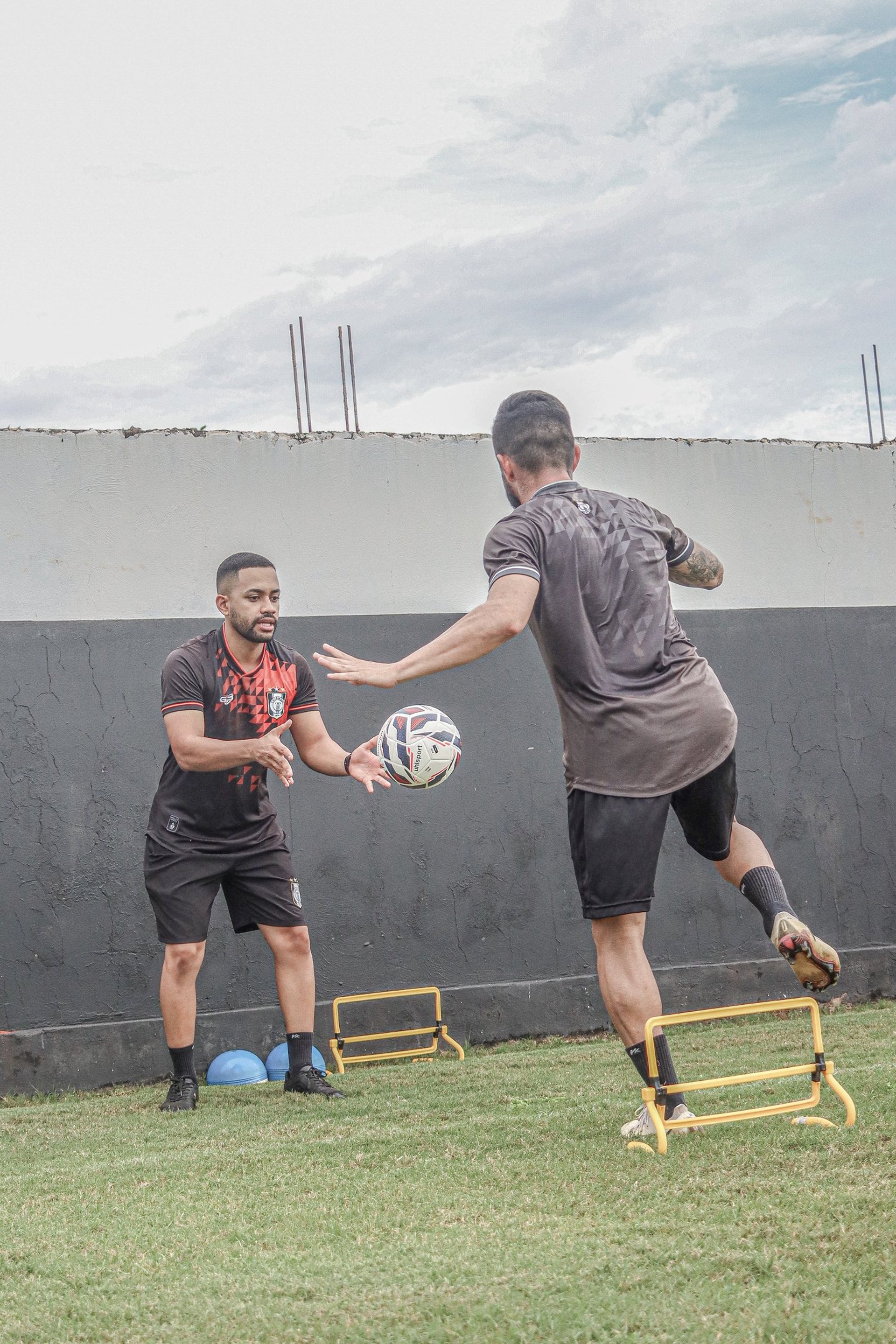 black and brown leather padded tub sofa