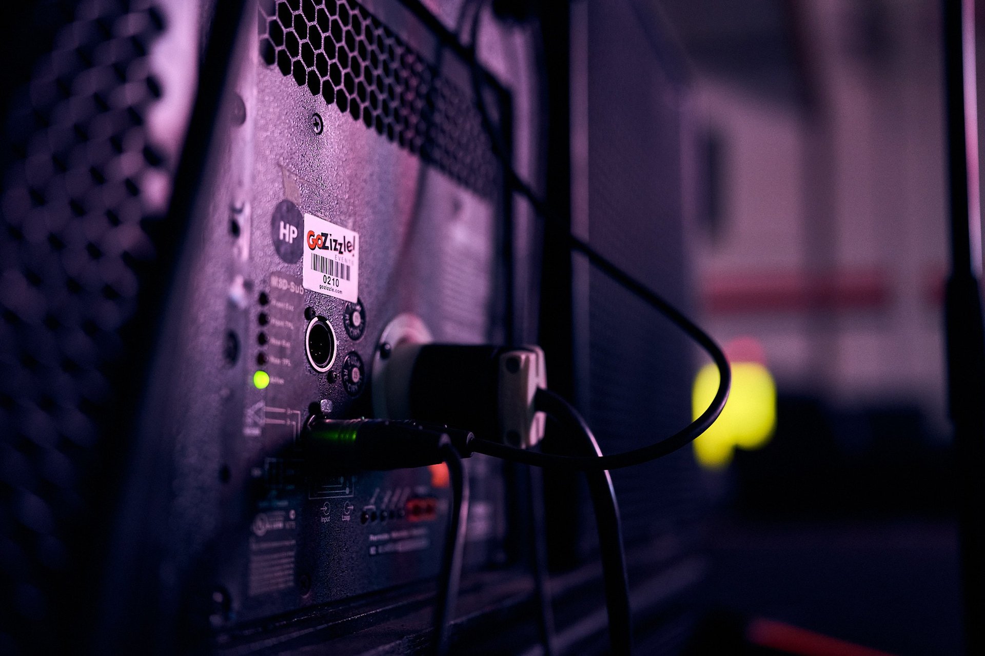 an abstract photo of a curved building with a blue sky in the background