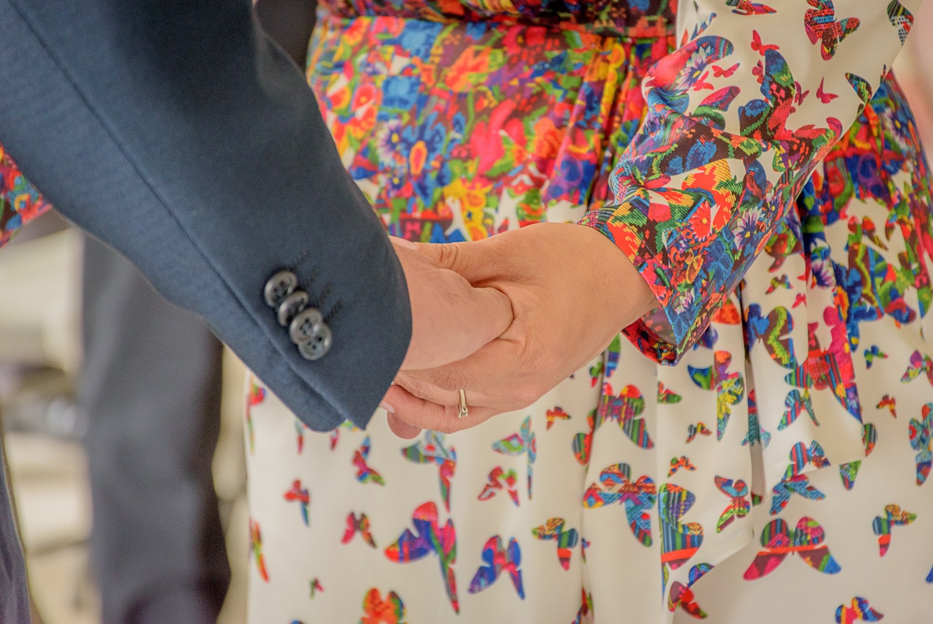 woman wearing yellow long-sleeved dress under white clouds and blue sky during daytime
