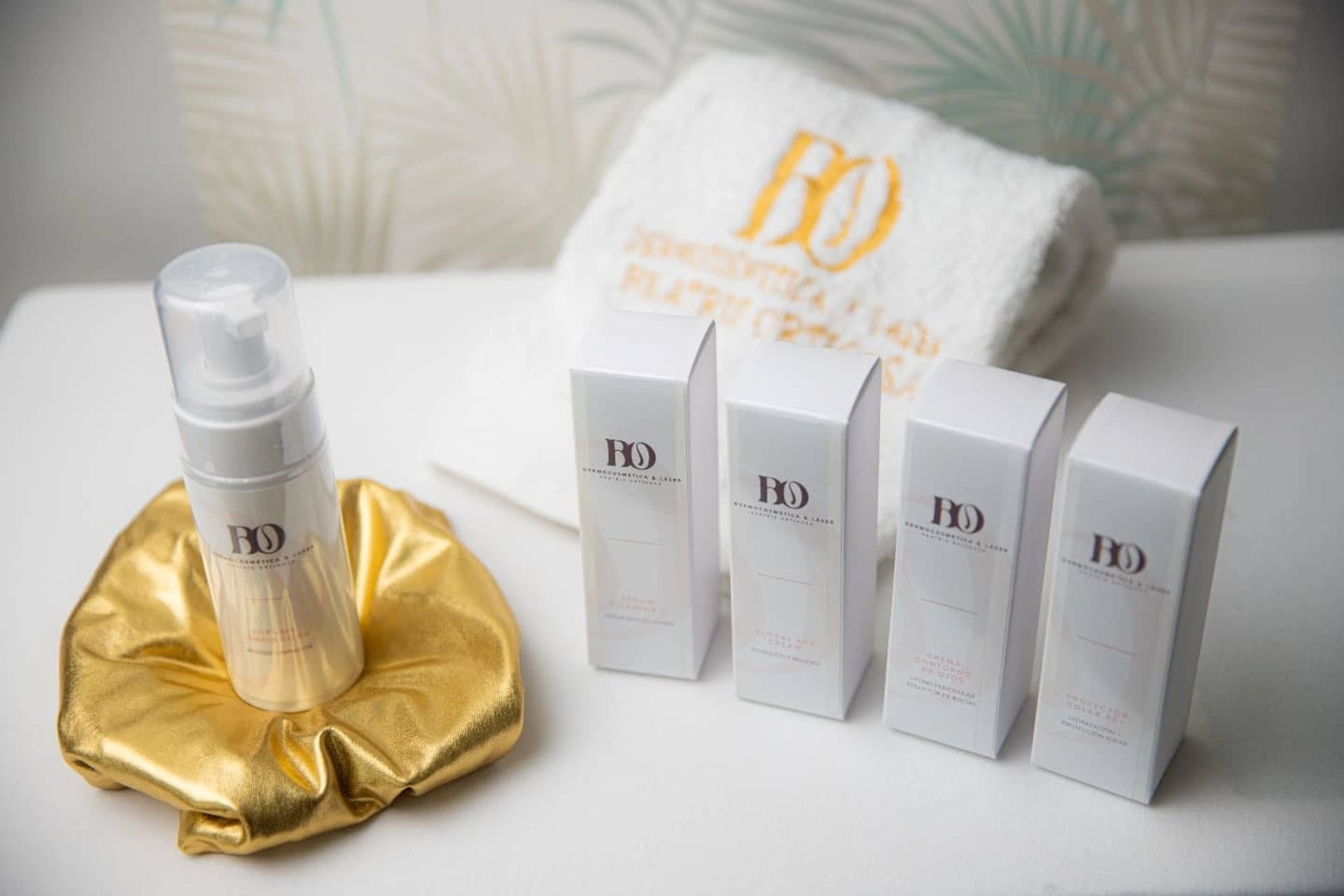 a woman getting a facial massage on her face