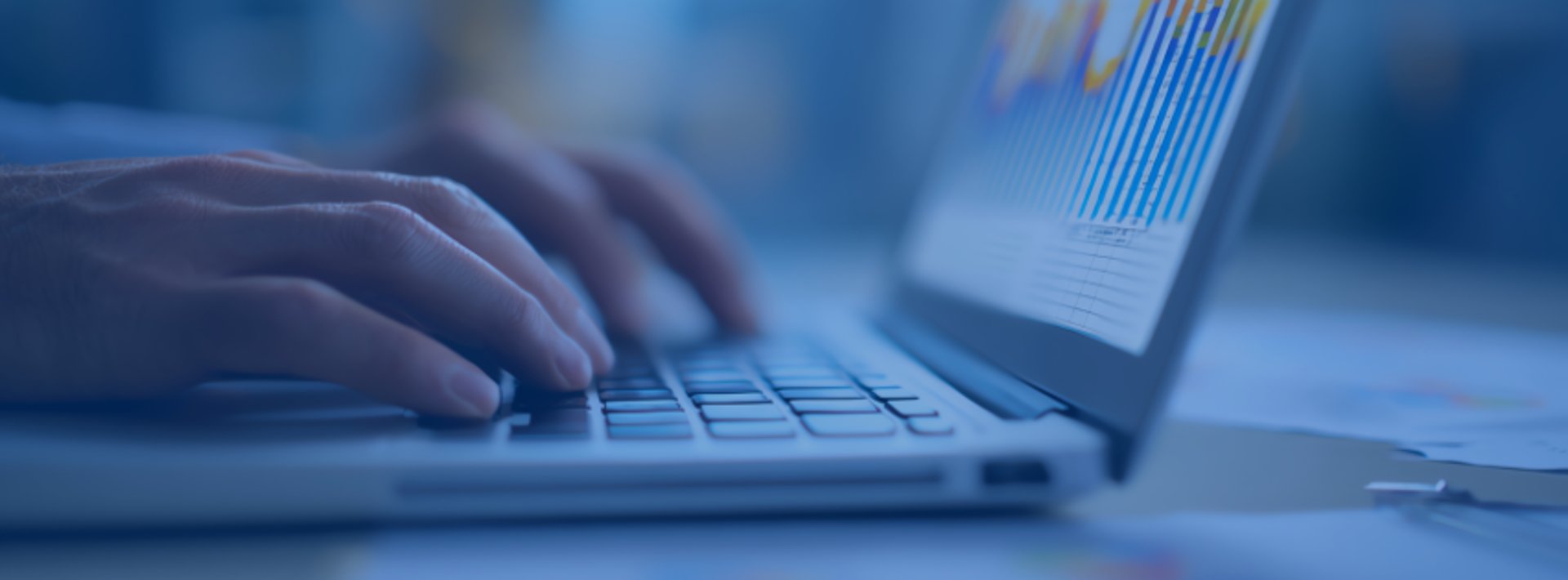 an abstract photo of a curved building with a blue sky in the background