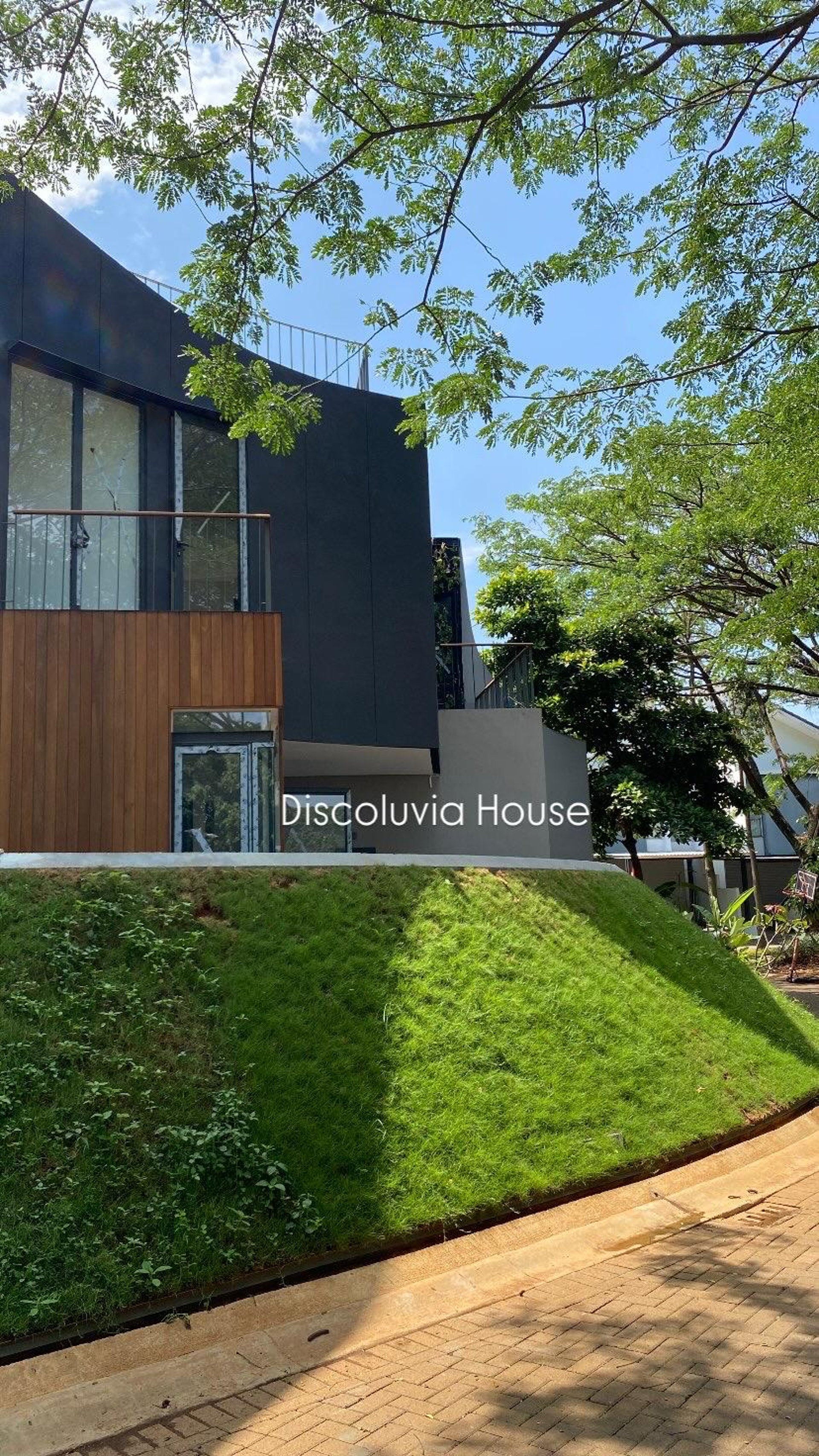 black and brown leather padded tub sofa