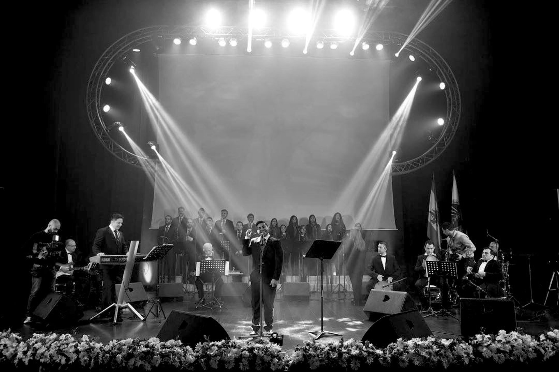 an abstract photo of a curved building with a blue sky in the background