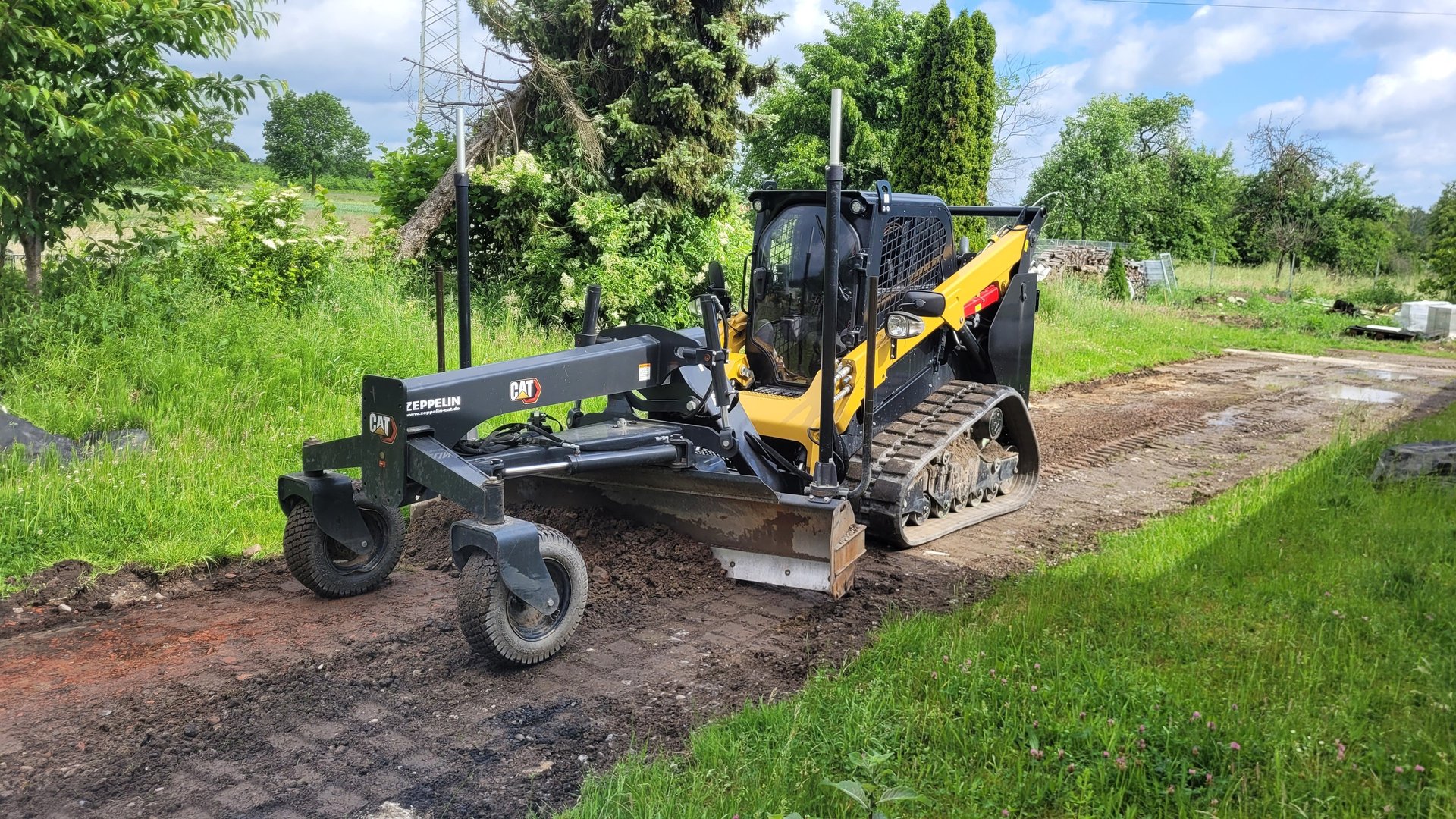 a large pile of dirt sitting next to a bulldozer
