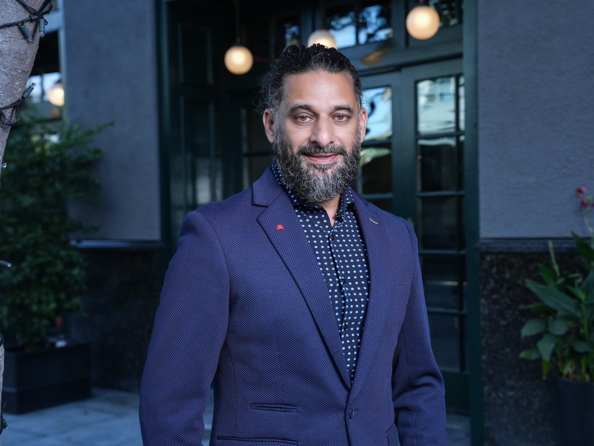 black and brown leather padded tub sofa