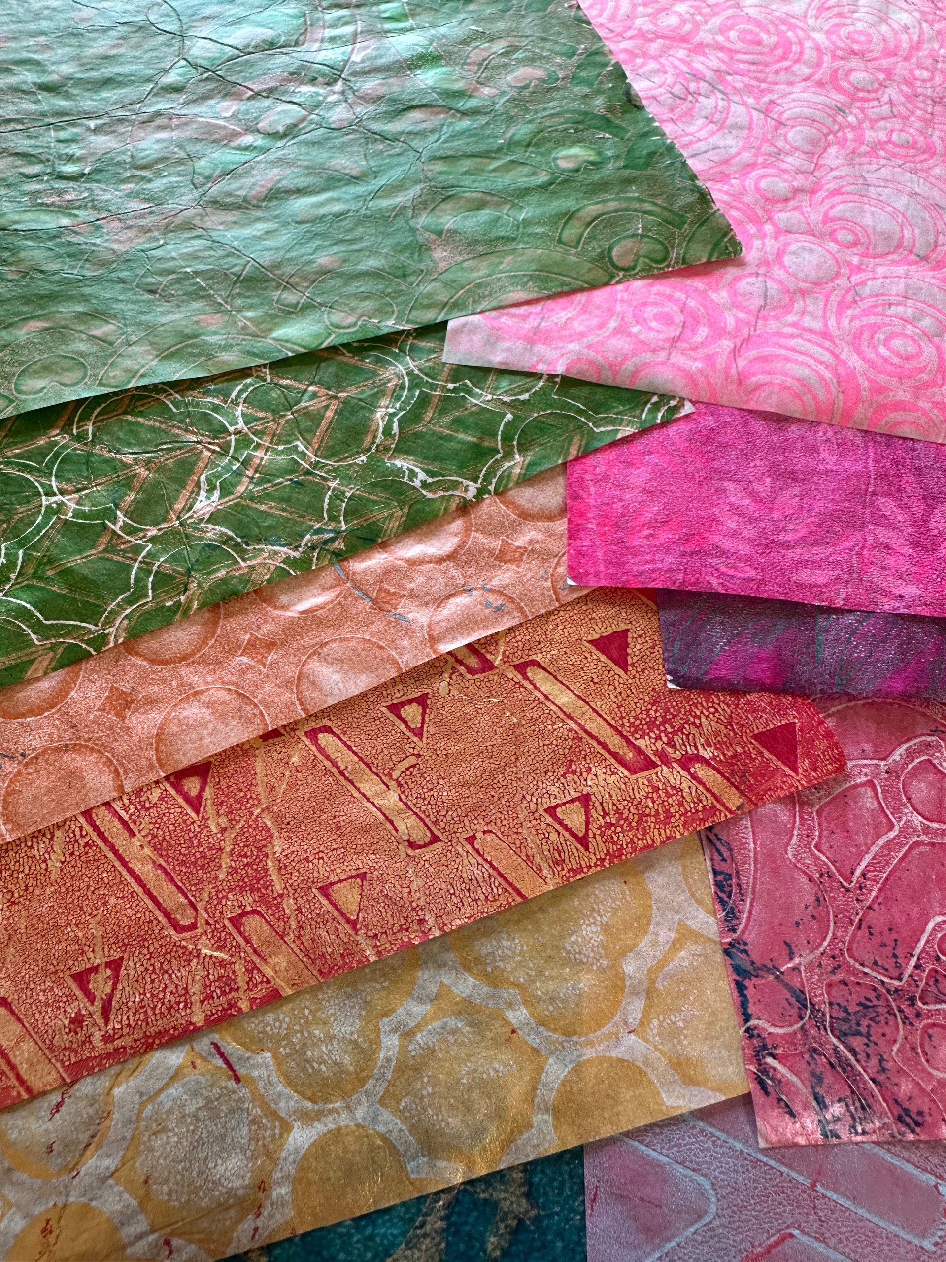 Hand-painted collage paper set with layered color, pattern, and iridescent detail