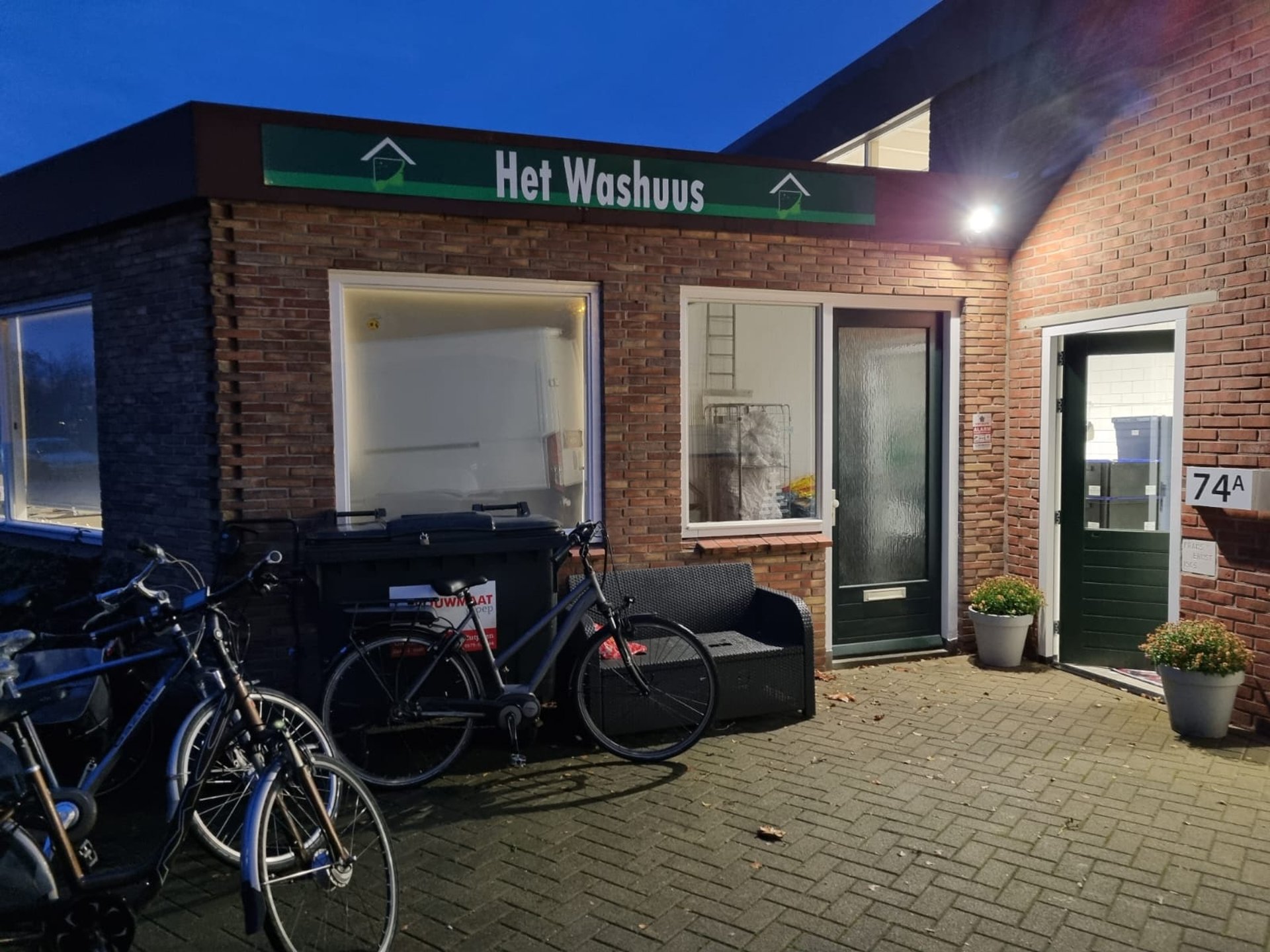 black and brown leather padded tub sofa