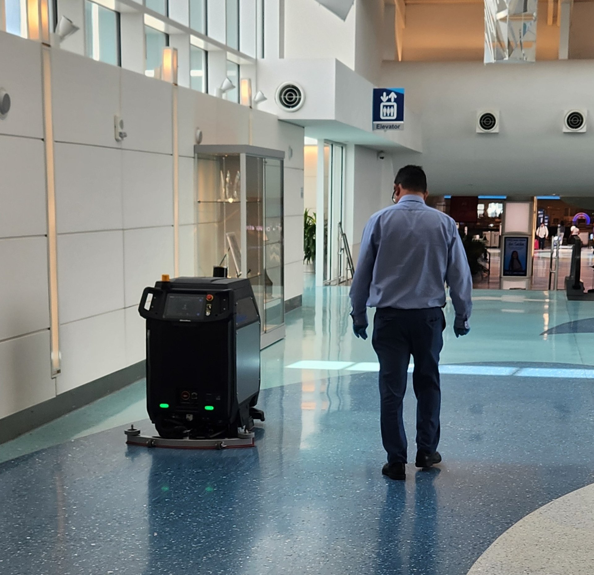 black and brown leather padded tub sofa