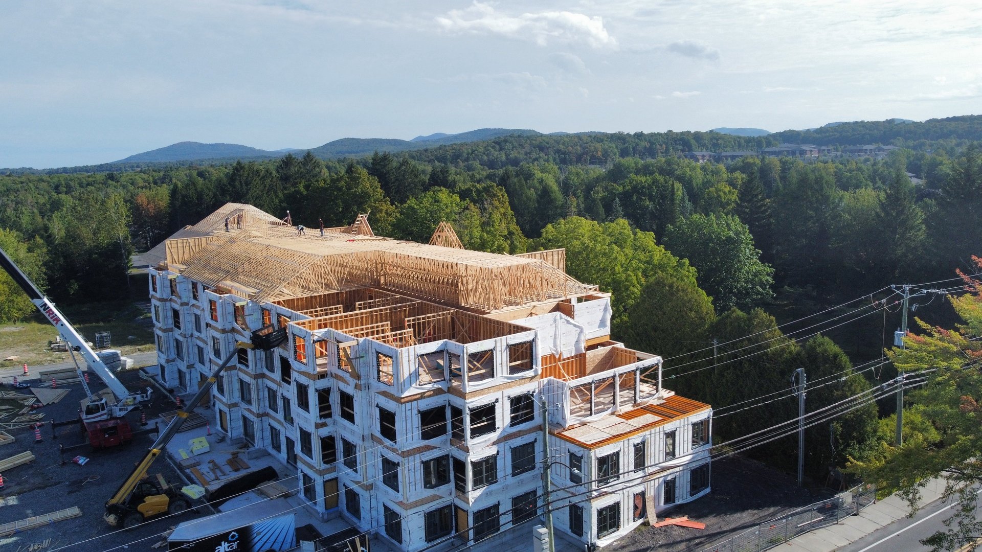 seven construction workers standing on white field
