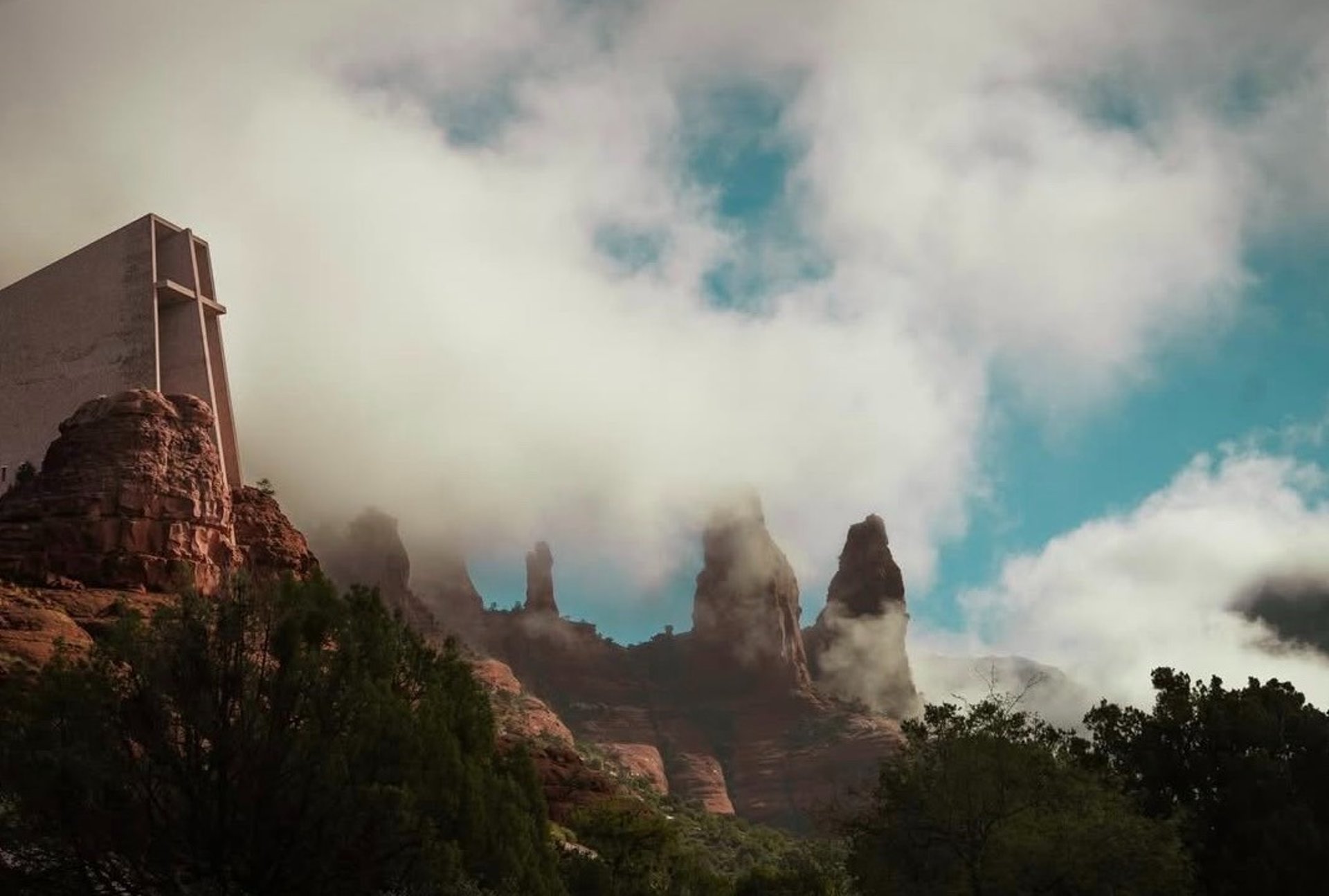 a scenic view of a town and a valley