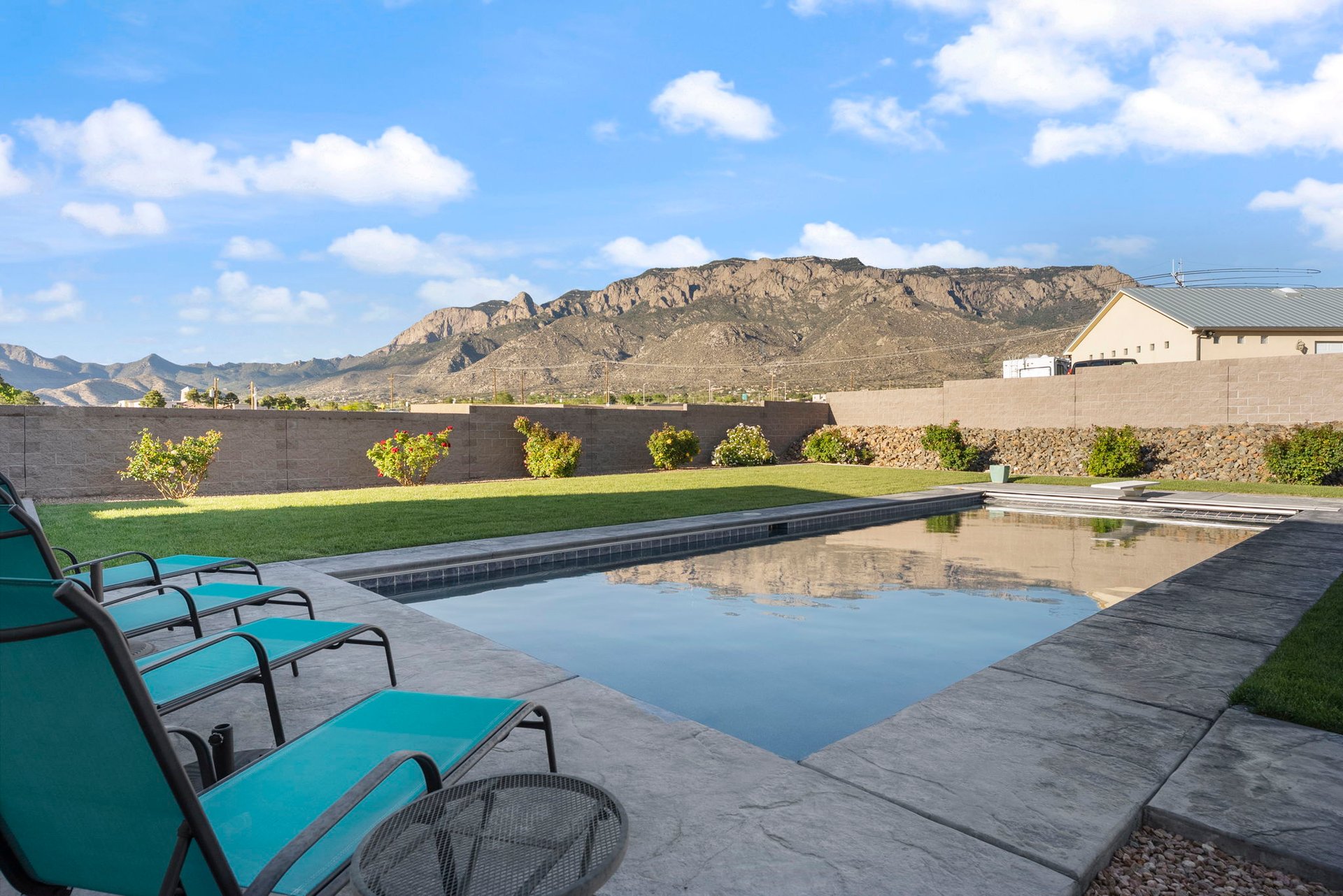 woman wearing yellow long-sleeved dress under white clouds and blue sky during daytime