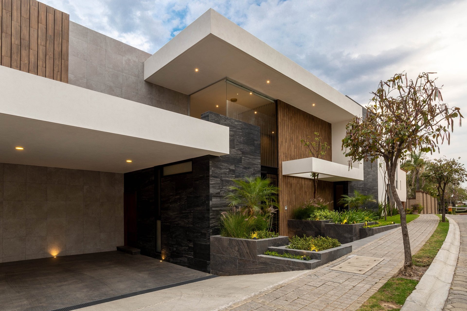 black and white cocnrete building low-angle photography